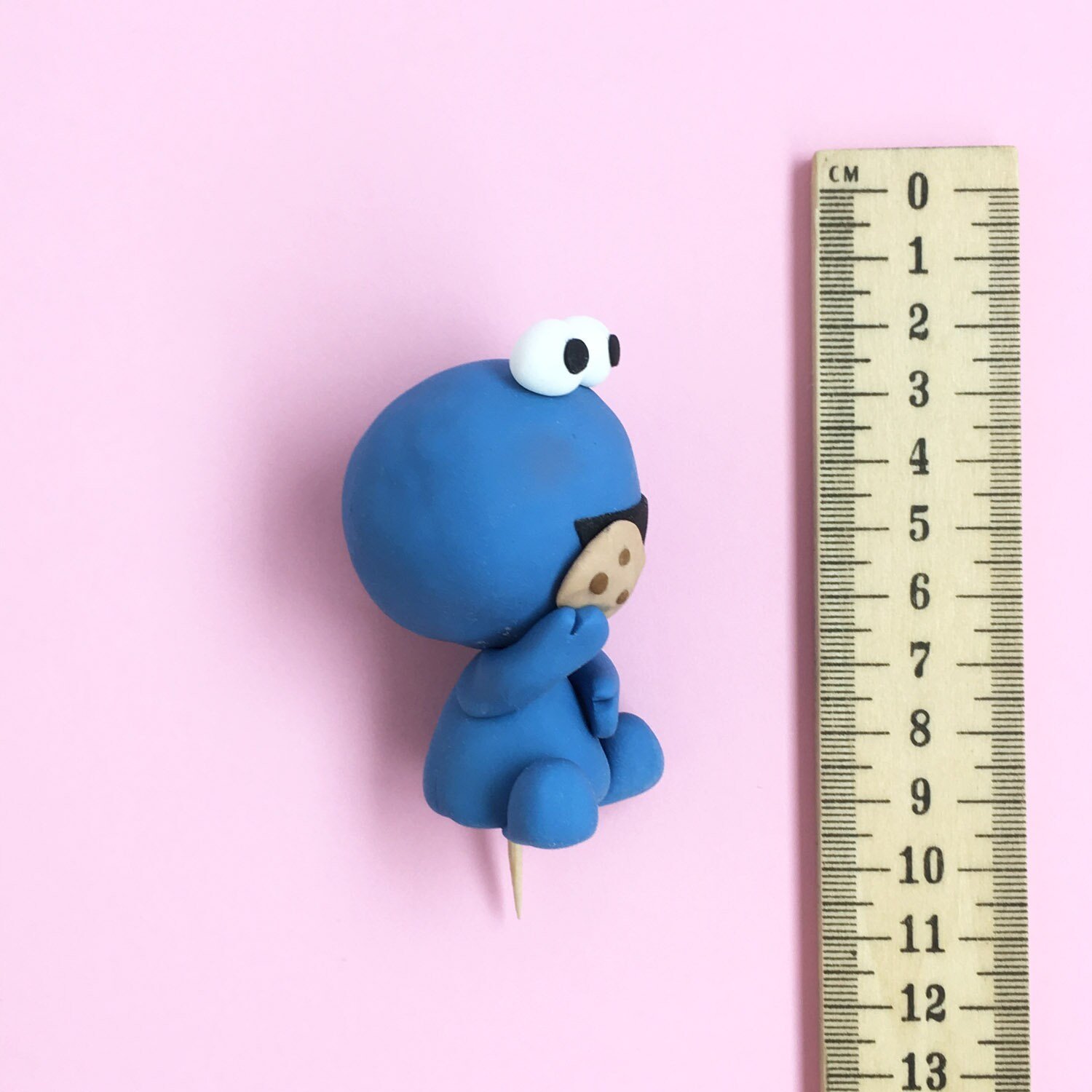 Cookie Monster Specialty Cake Topper is by far the most relatable who doesn’t love a cookie nom nom