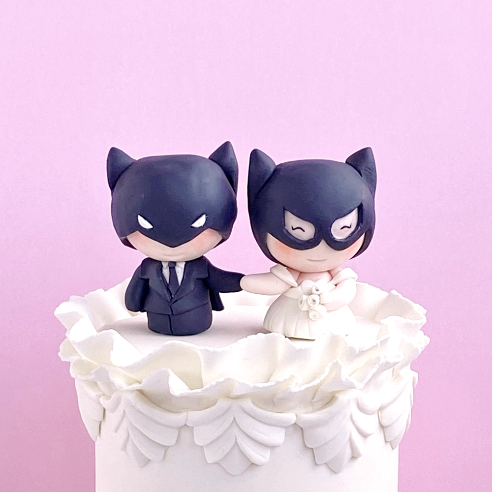 batman catwoman bride and groom wedding party celebration cake topper.png