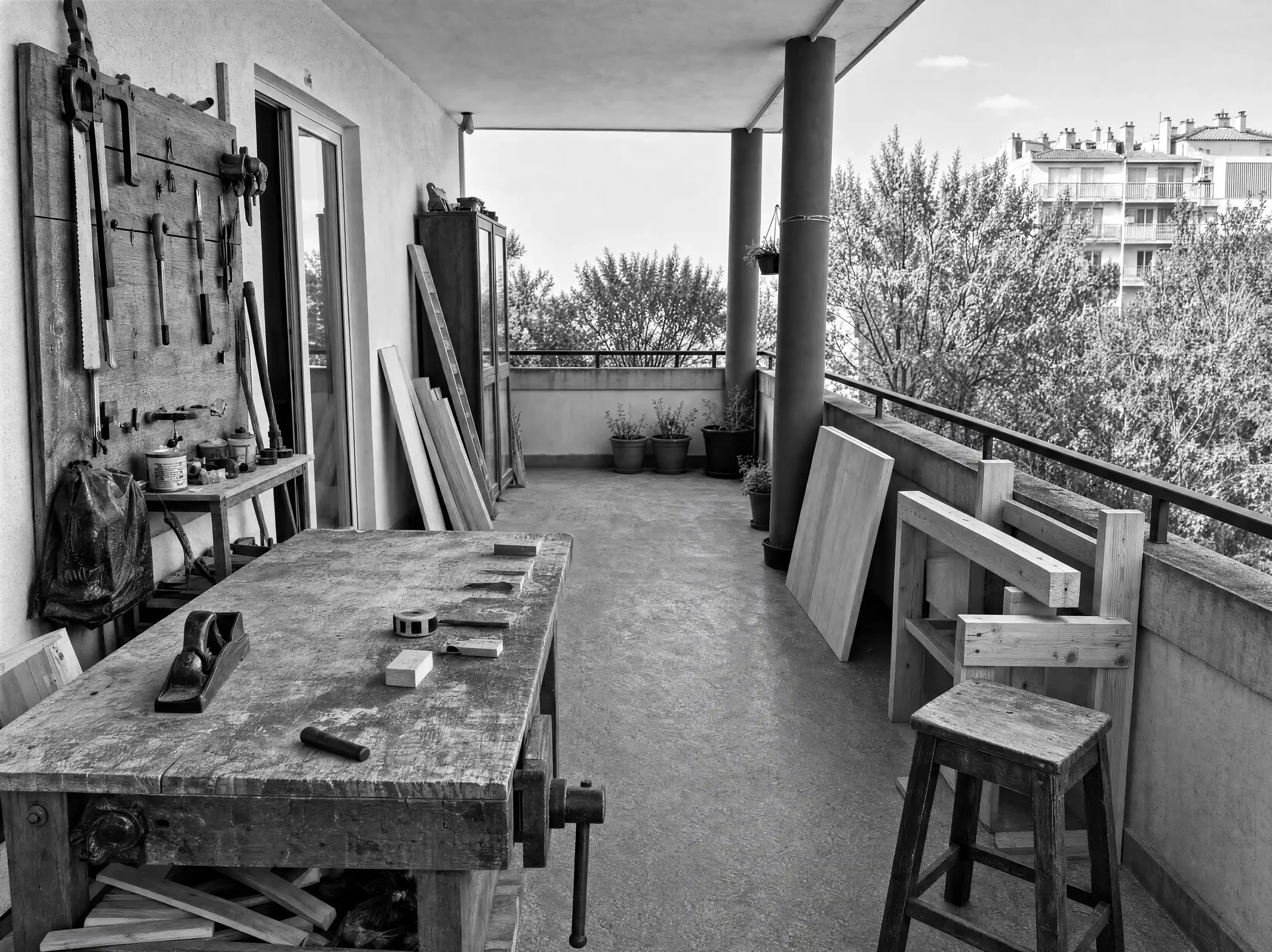 Rocky's first workshop — a Melbourne balcony where B.A. Furniture was born