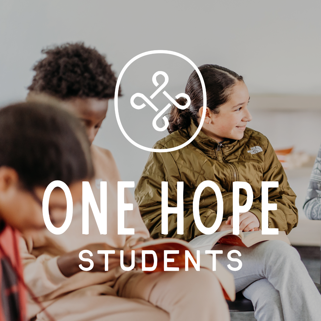 Group of people sitting on chairs in a room with 'One Hope Middle' logo overlay.