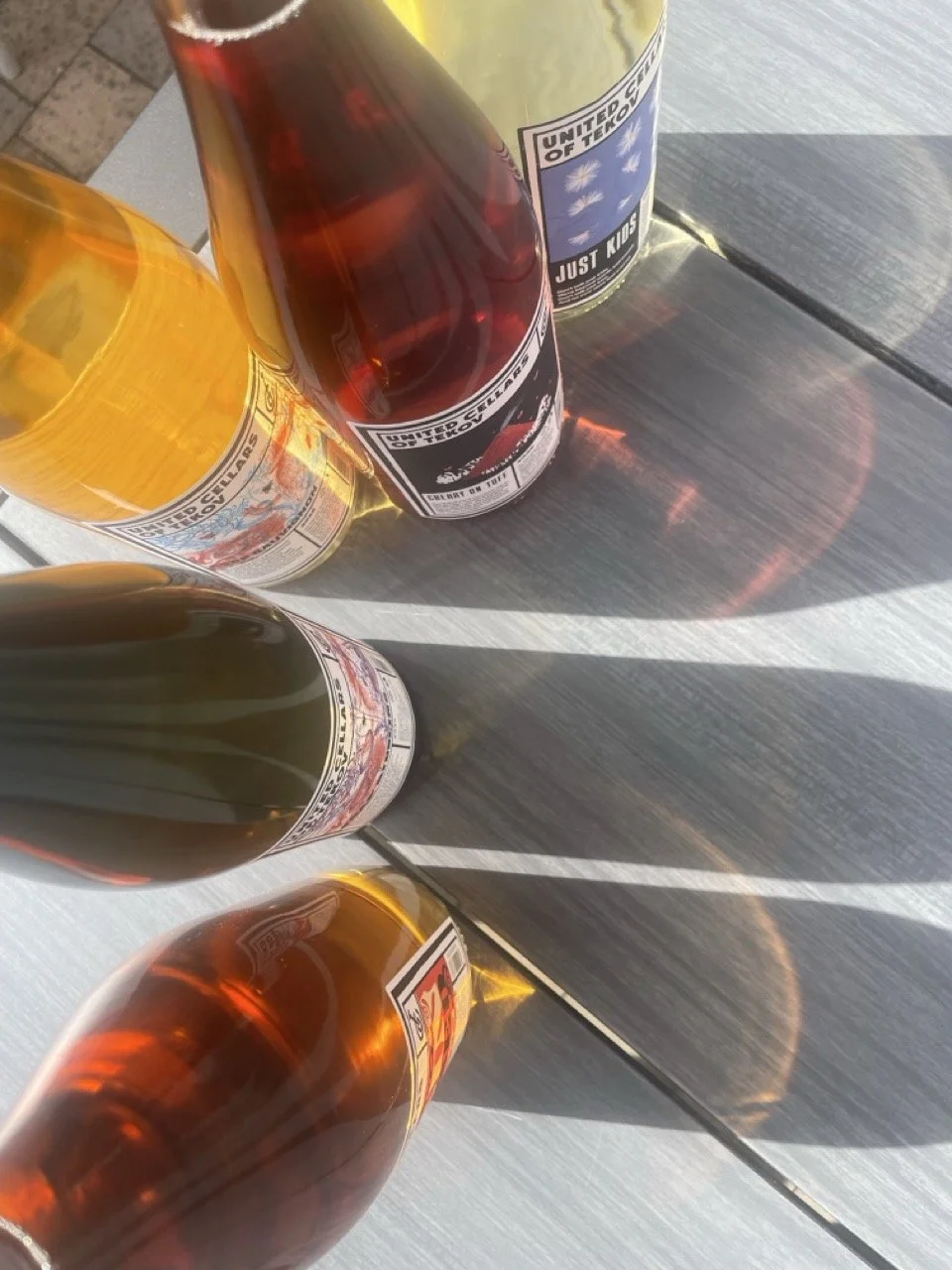 Colourfull bottles of Tekov Cellars wines