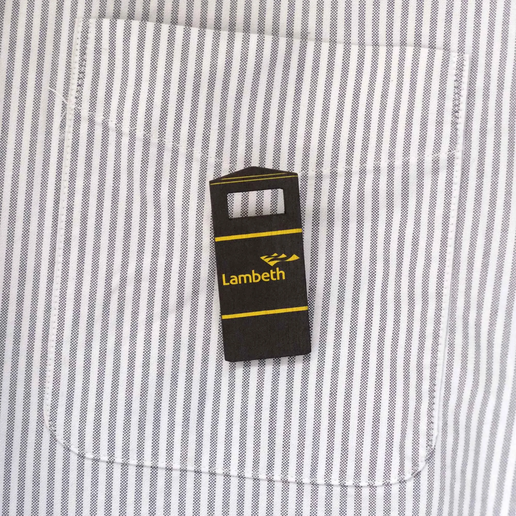 Lambeth bin badge on a stripy shirt pocket