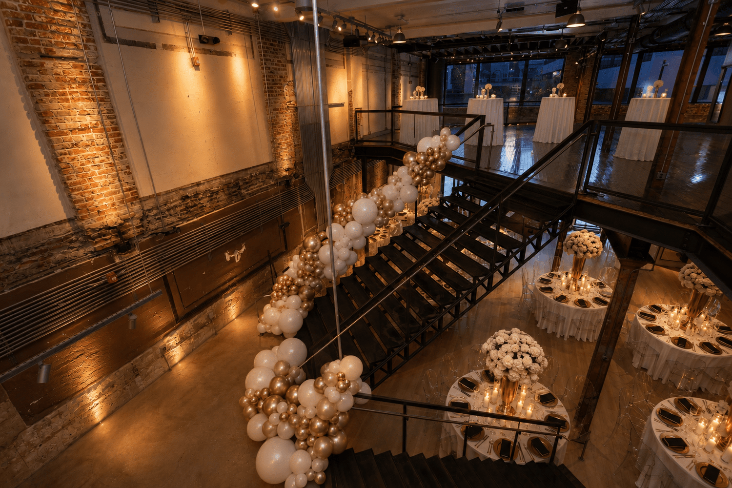 Gold and white celebration décor around the staircase