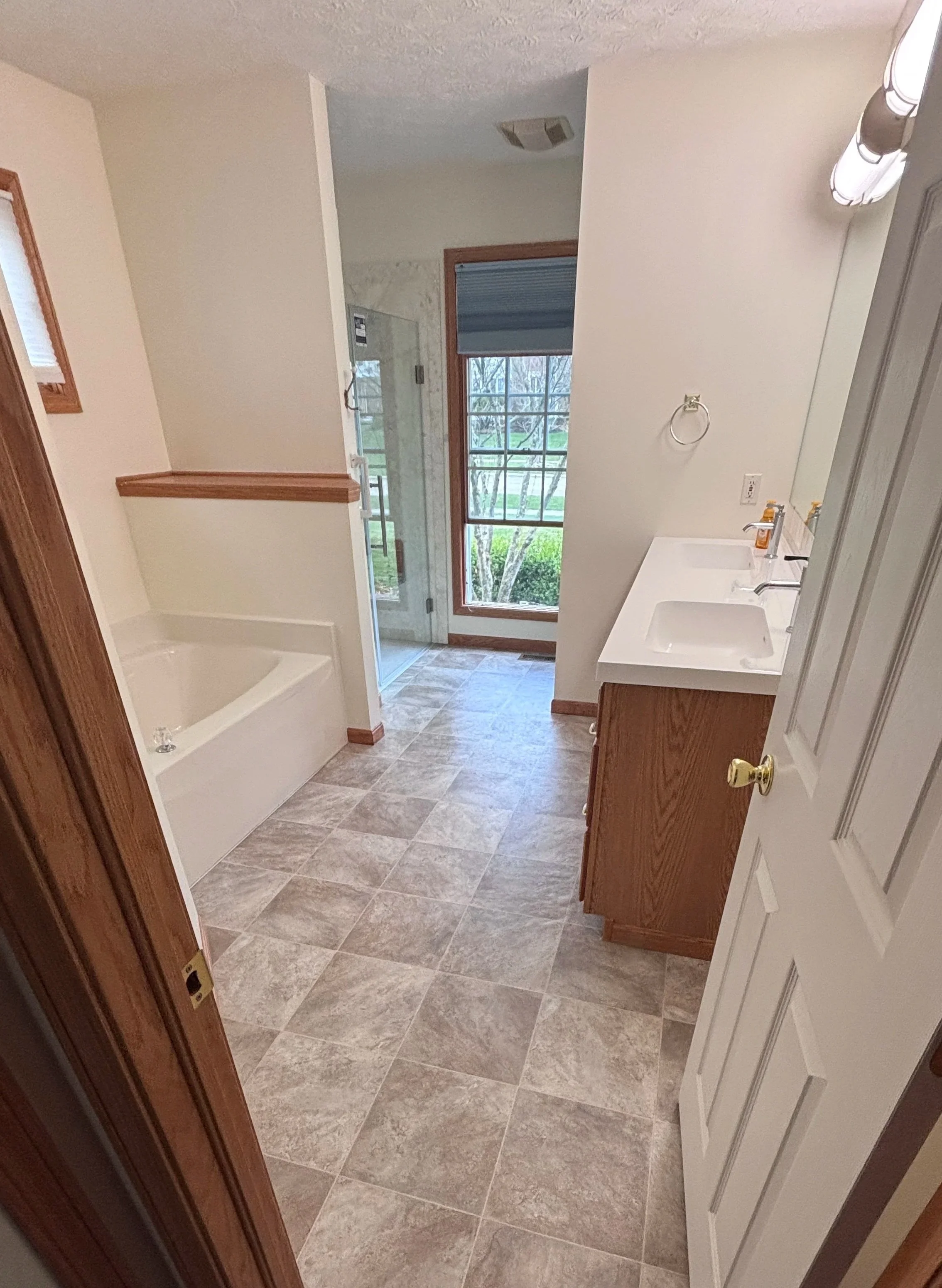 handyman bathroom remodel curbless shower swinging shower door new flooring vanity top painting wall mounted shower seat hand sprayer grab bars