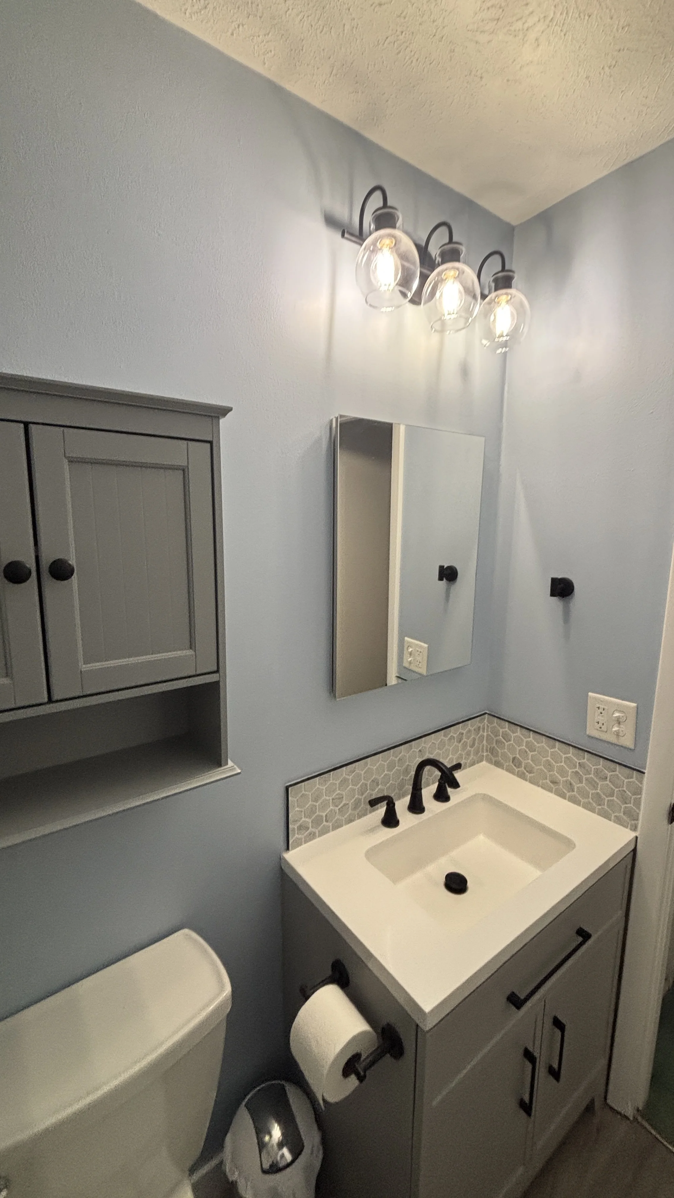 Bathroom remodel tile bathroom new flooring before and after handyman new vanity light fixtures exhaust fan doors