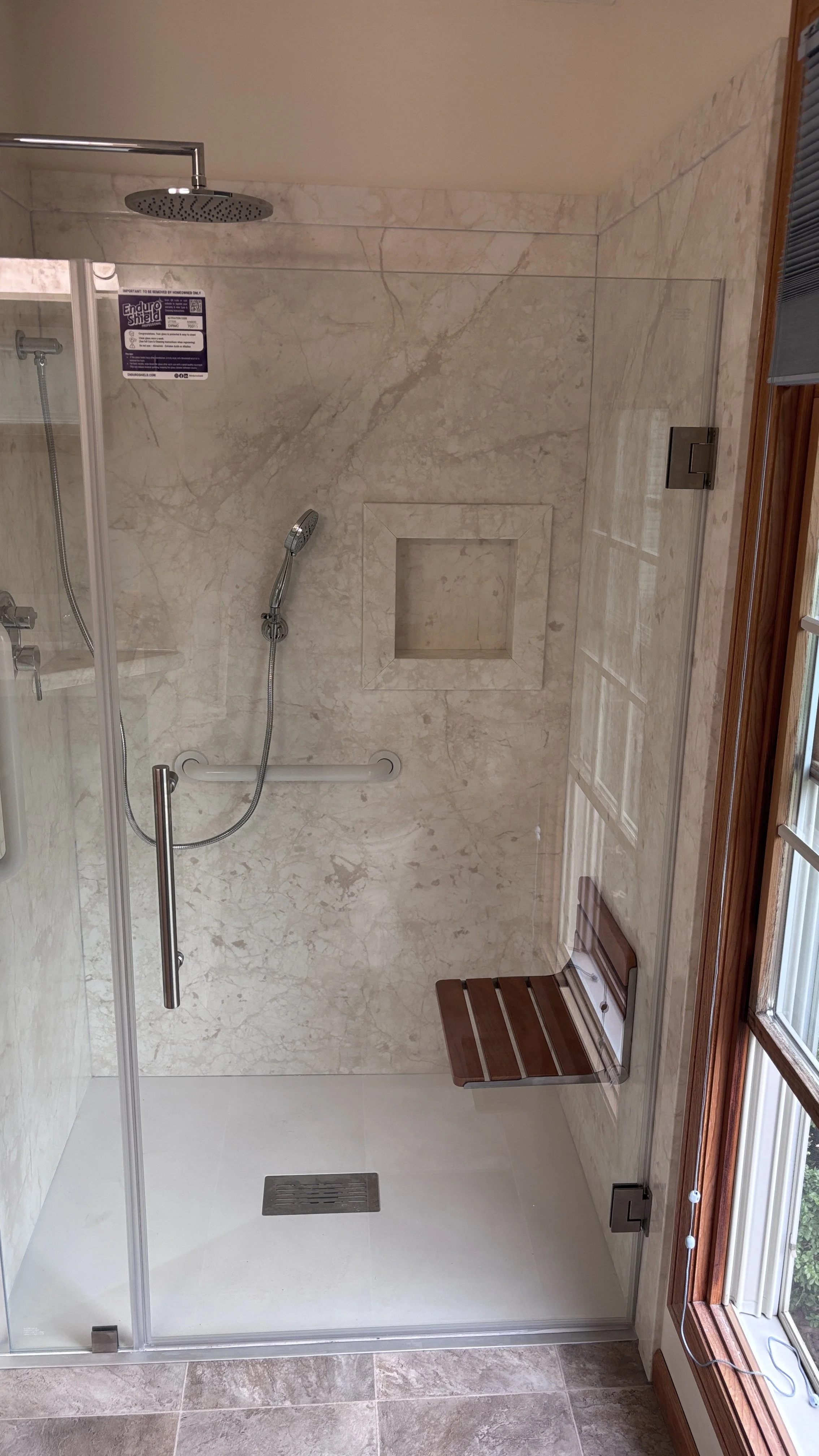 handyman bathroom remodel curbless shower swinging shower door new flooring vanity top painting wall mounted shower seat hand sprayer grab bars