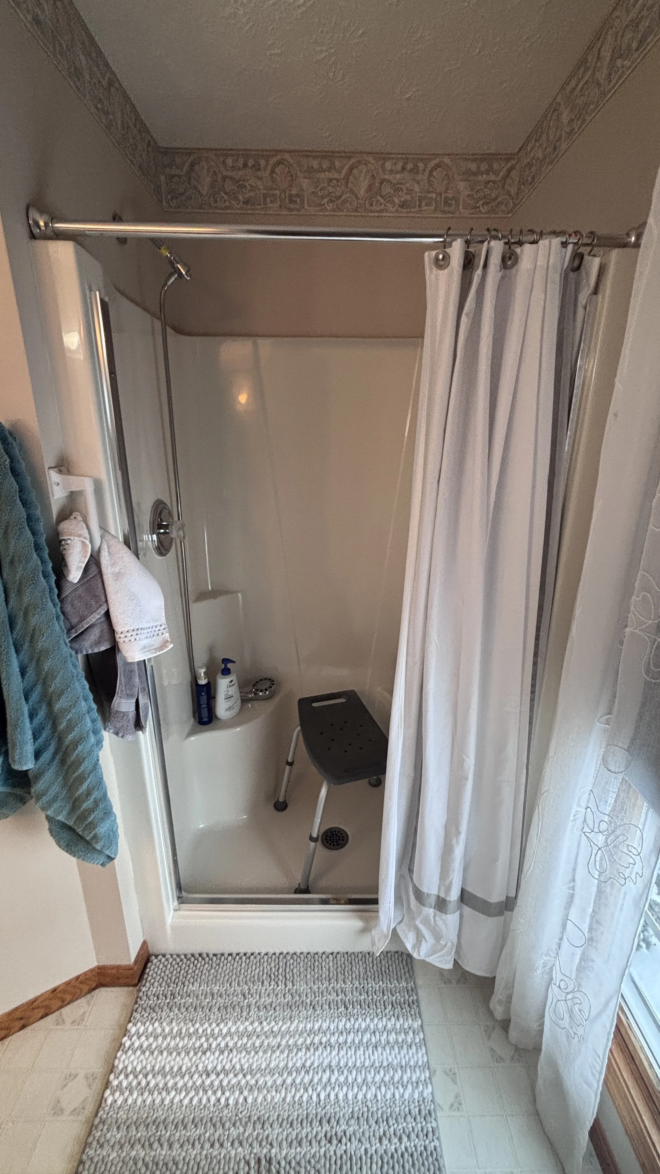 handyman bathroom remodel curbless shower swinging shower door new flooring vanity top painting wall mounted shower seat hand sprayer grab bars