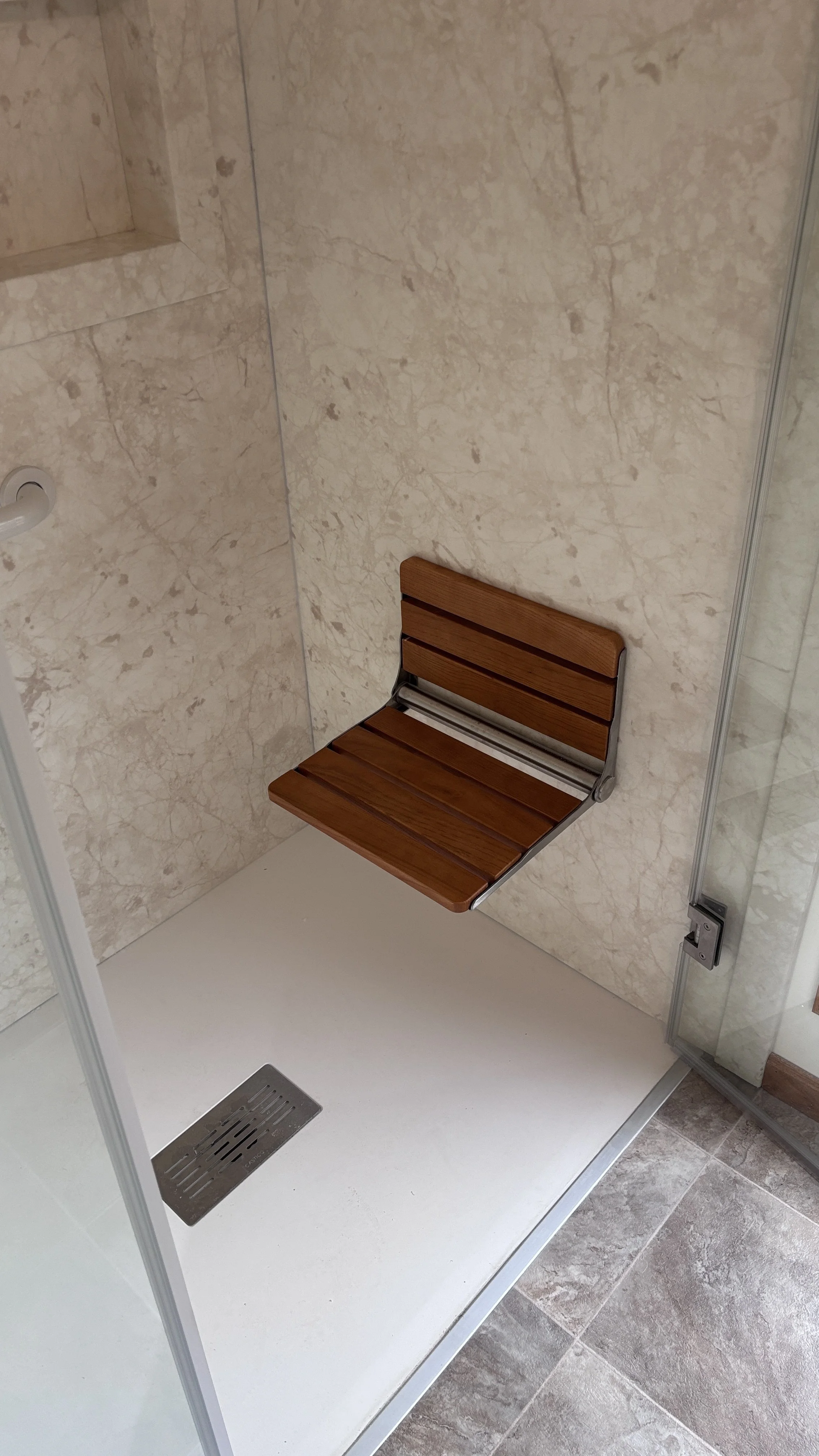 handyman bathroom remodel curbless shower swinging shower door new flooring vanity top painting wall mounted shower seat hand sprayer grab bars