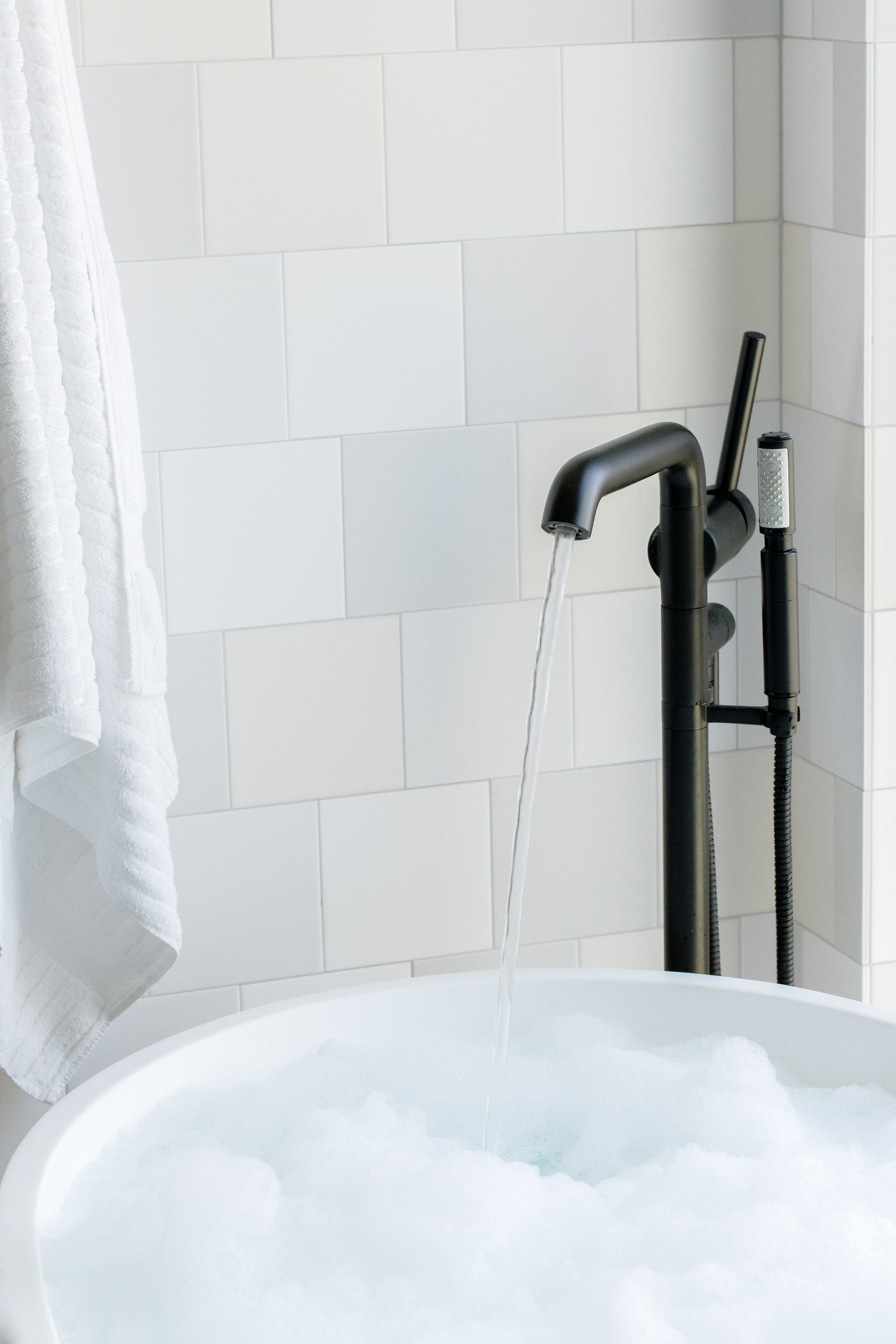 Creating this bubble bath in one of the stunning Hotel SLO suites was the highlight of the photoshoot! Besides swirling and arranging the bubbles just right. Chef's kiss photo! Photographer: Catherine Coelho, Nouvelle Brand Photography
