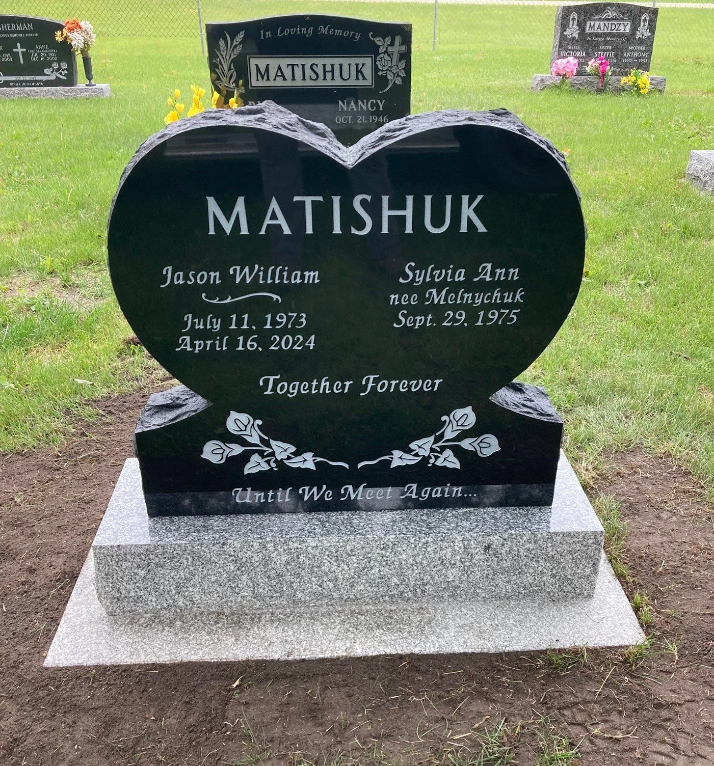 Steinbach Memorials. Black Heart Shaped Memorial stone.