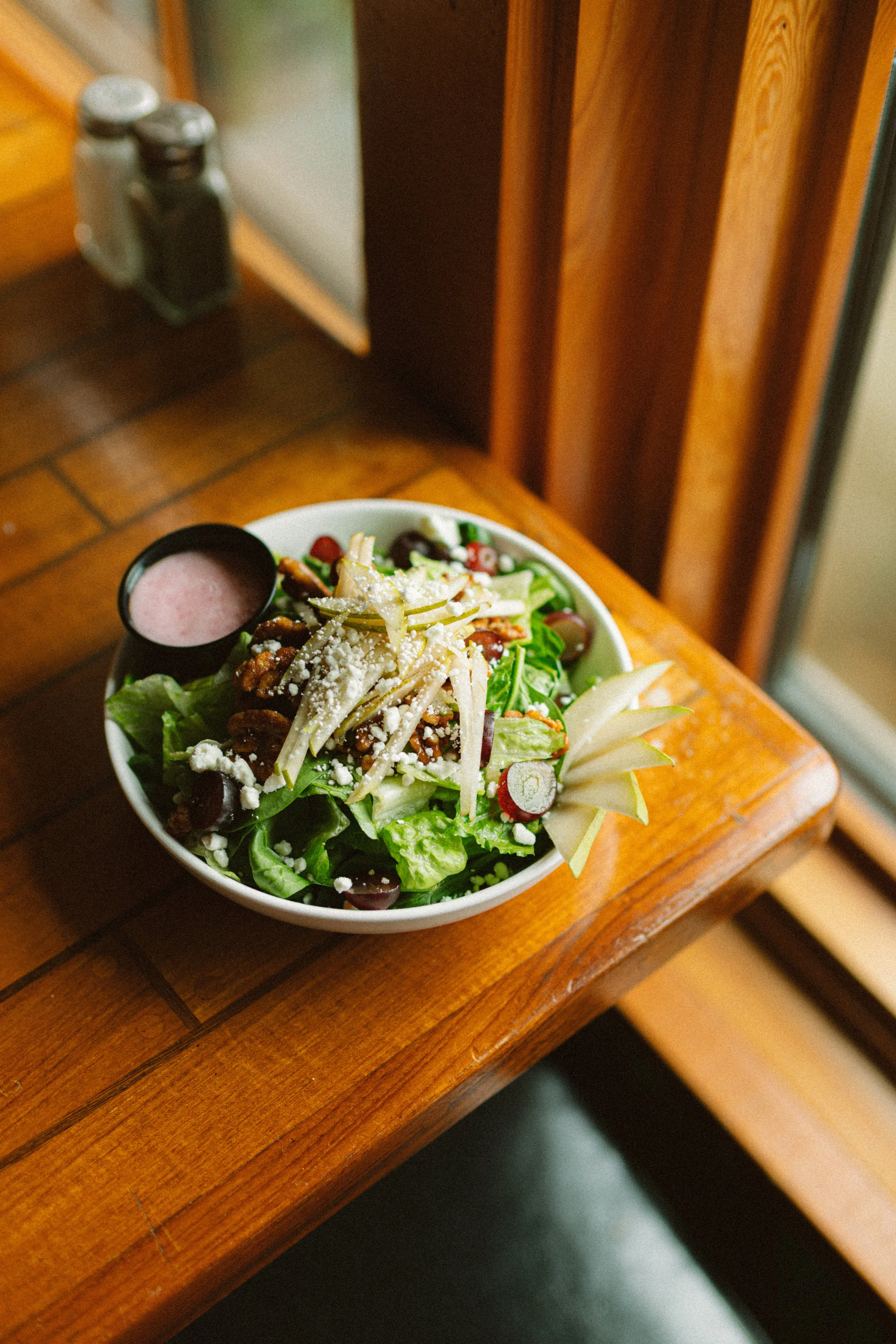 Salad with Kaiger dressing the Pitchwood in Raymond, WA on the southern Washington coast, photographed by Chelsea Moudry Studio
