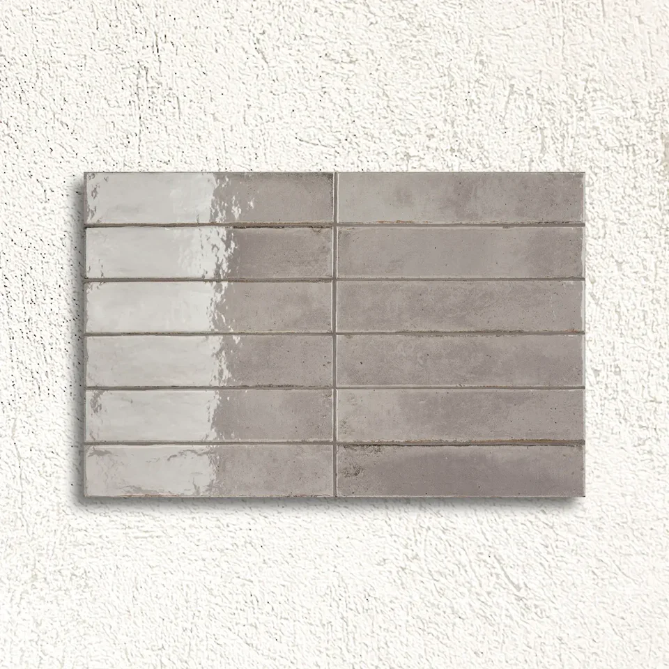 577200013_Lisbon_Grey-Shine_5.6x26.7cm_FACE_fd801a6e-1b52-4ac4-9d04-32a3e55b6c55.webp
