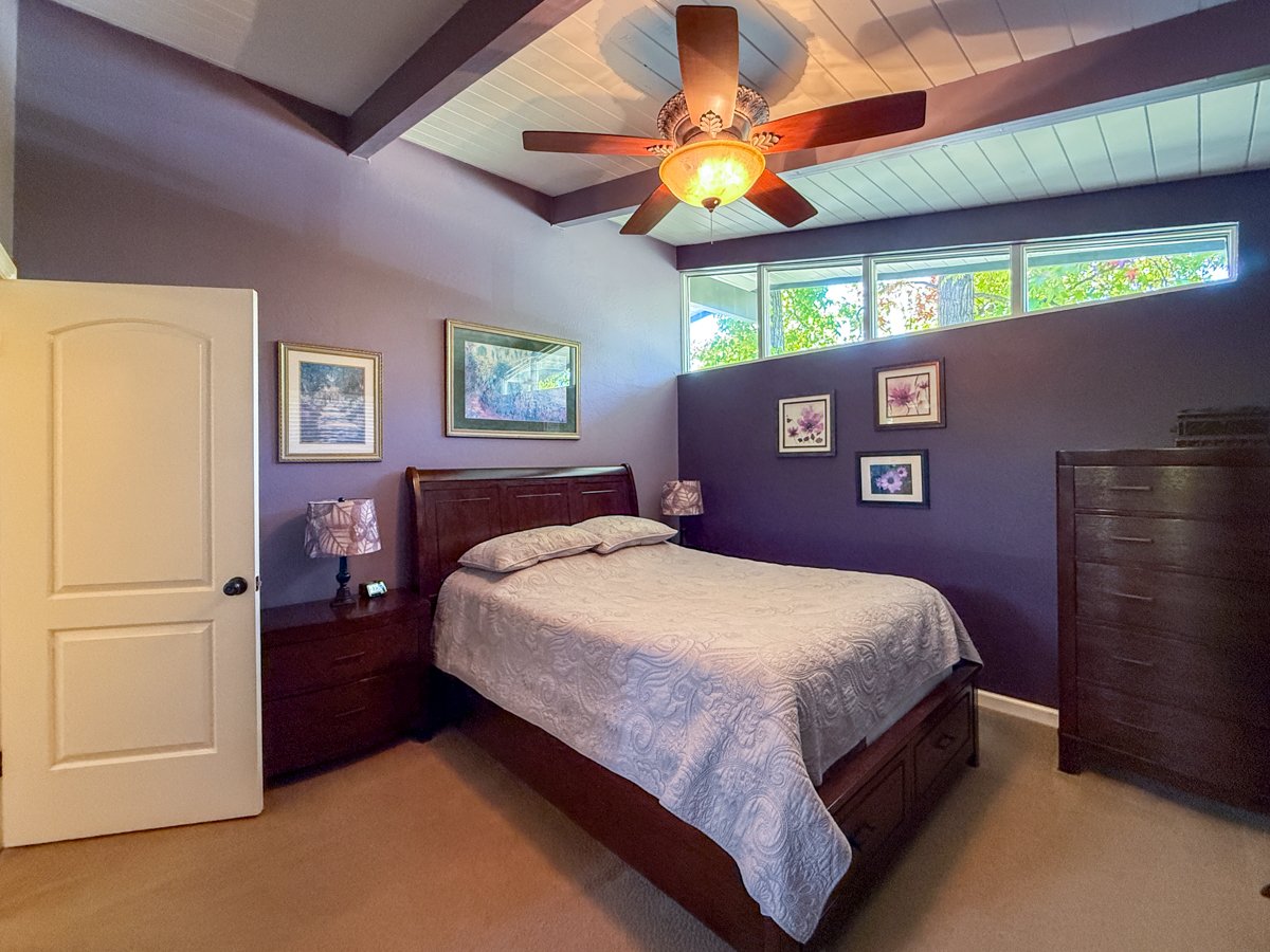 Primary bedroom with clerestory windows. 