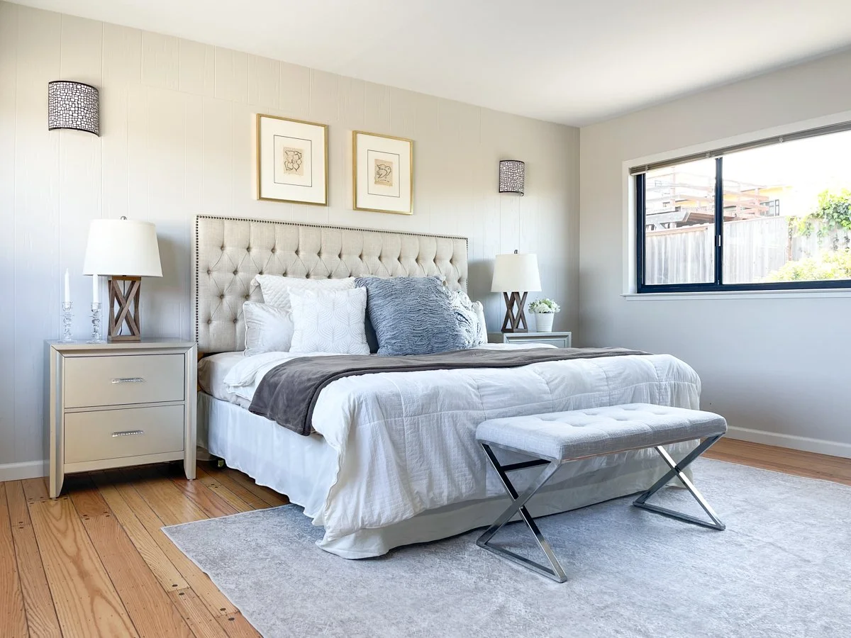 Bed with tufted headboard. 