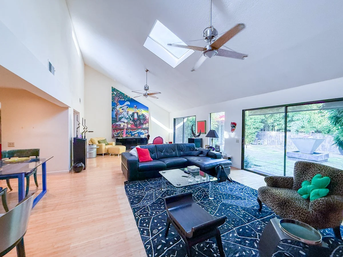 Vaulted ceilings and view to private  back patio.