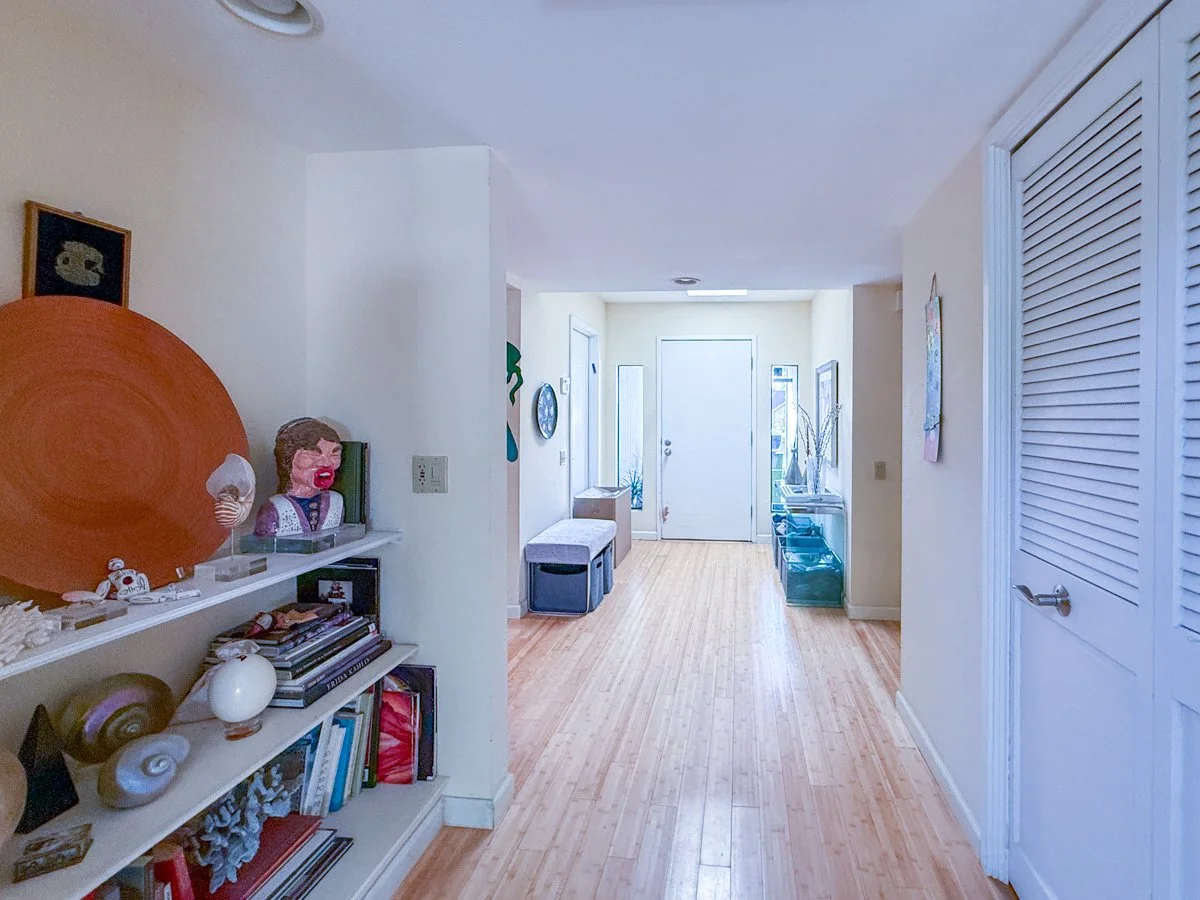 Hallway from living room to front door. 