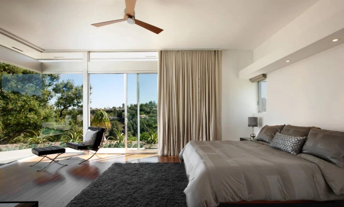 mcm house with clerestory windows covered by curtains.