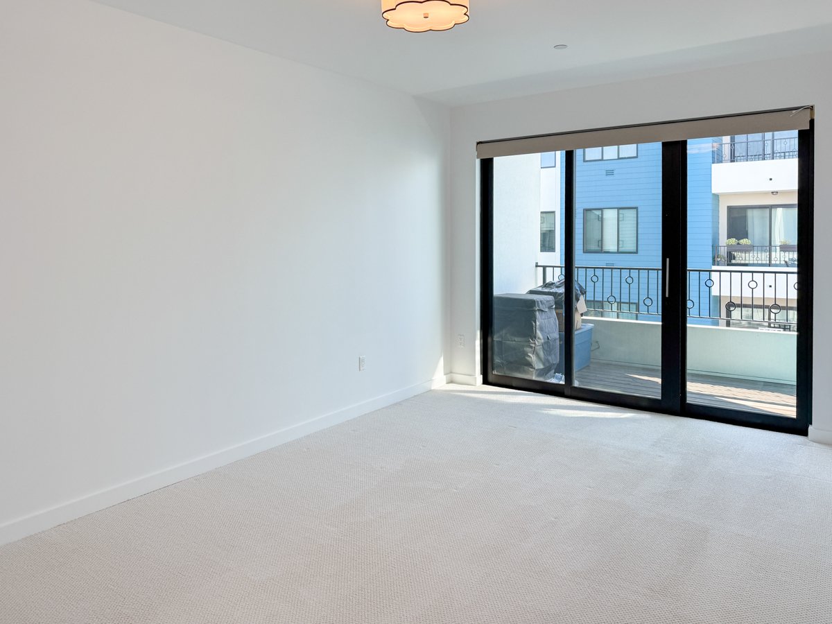 Primary 1 balcony with courtyard view. 