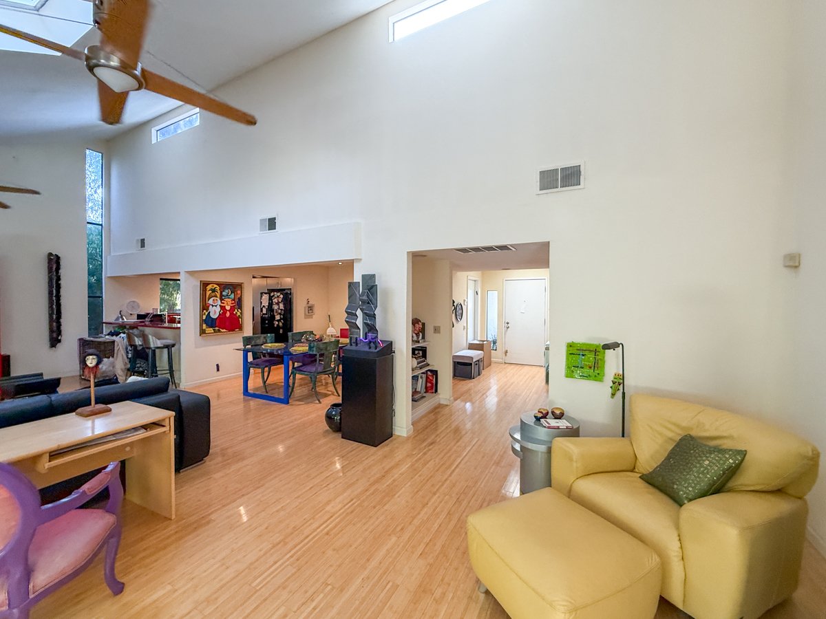 Living room view into dining area and kitchen. 