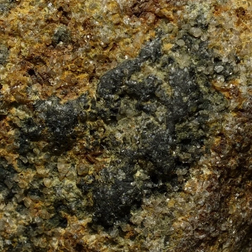 Uraninite uranium ore embedded in quartz matrix with iron staining high activity radioactive mineral specimen