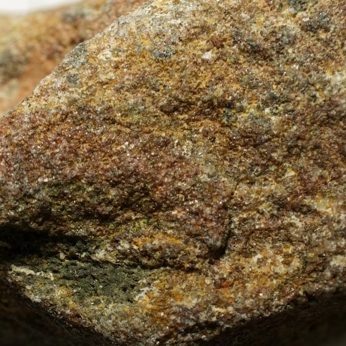 Uraninite uranium ore embedded in quartz matrix with iron staining high activity radioactive mineral specimen