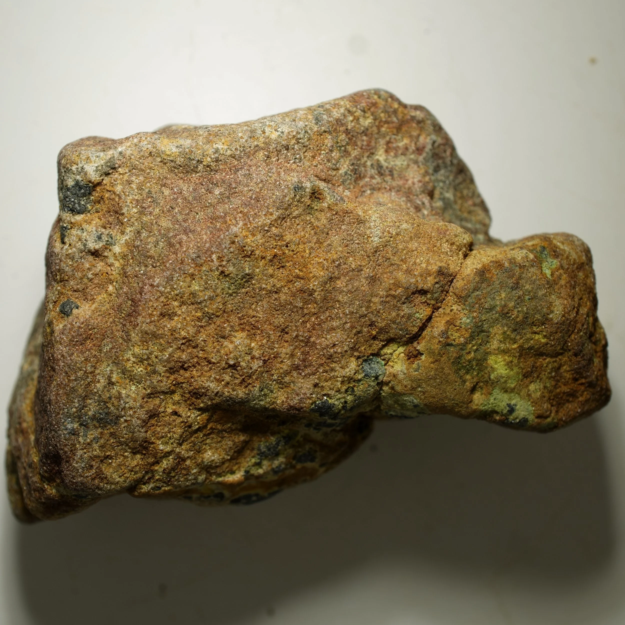 Uraninite uranium ore embedded in quartz matrix with iron staining high activity radioactive mineral specimen