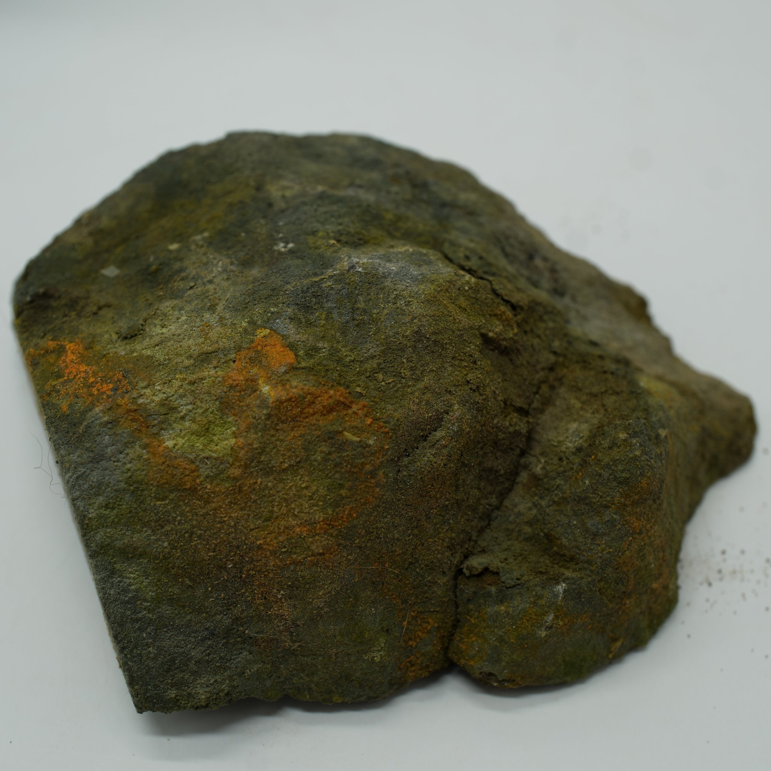 Compact Utah uranium ore specimen with carnotite mineralization measuring 3.5 inches and emitting 25,000 CPM