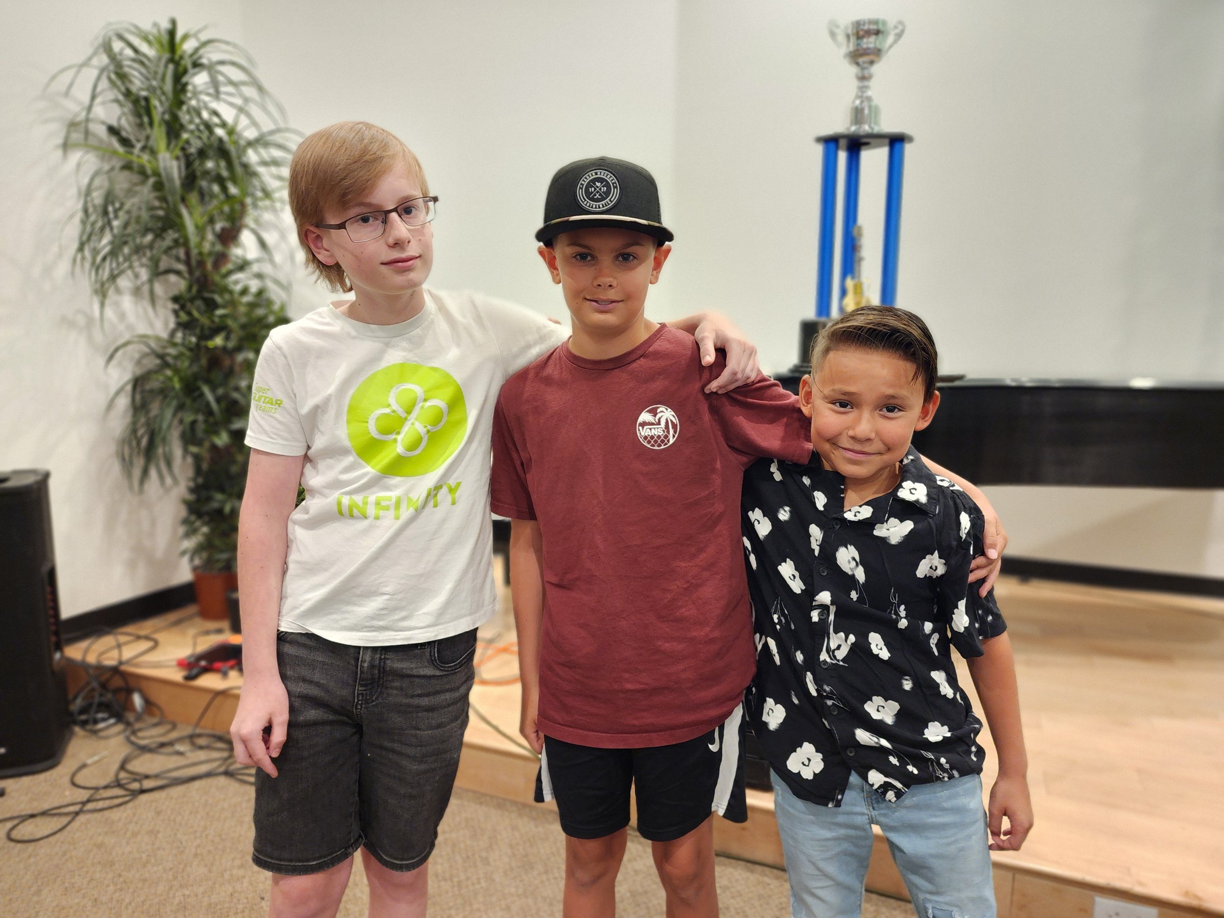 From left: Archer Swallow, Kyson McOmie, Leian Cervantes - Team Infinity Guitar 1 Fall League 2024