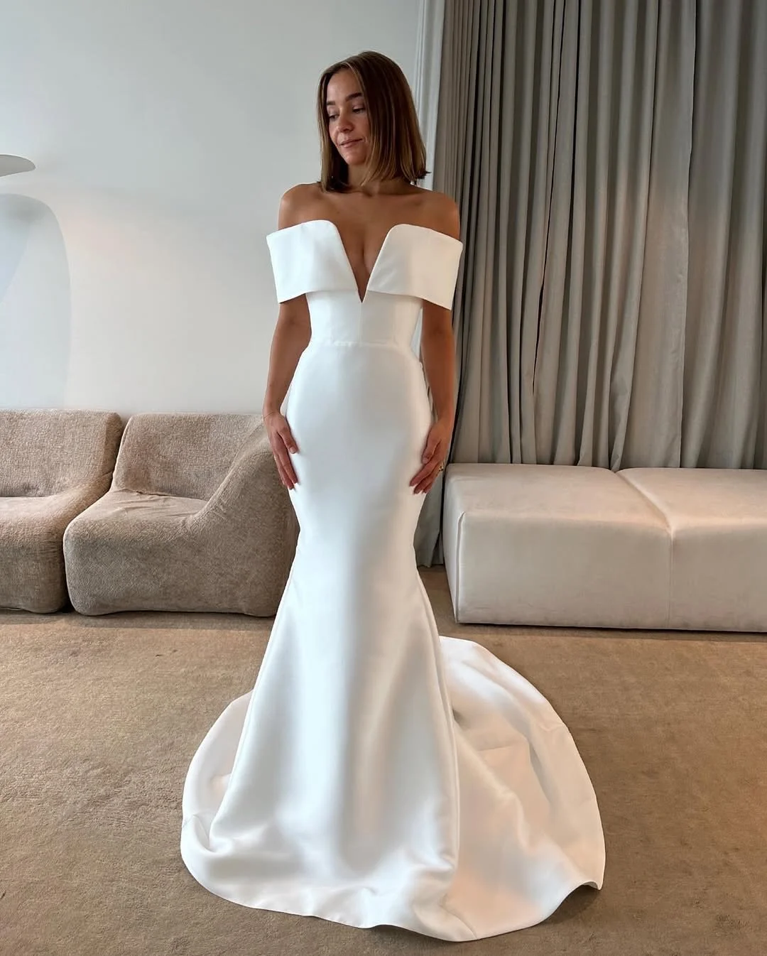 Kyha Bride Berkeley &mdash; original price: $5,995. Sale price: $2,997. Find this Kyha sample gown, the ultimate minimalist with a full fashion feel, on sale at The Find Bridal Outlet.