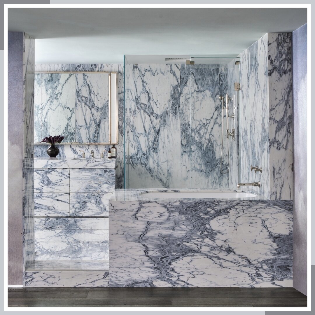 The bathroom from our Hunter Residence was designed with sophistication in mind. It features stunning Azul Nuvolato quartzite, which adds captivating depth and texture to the room. Additionally, The room is equipped with top-of-the-line Waterworks fi
