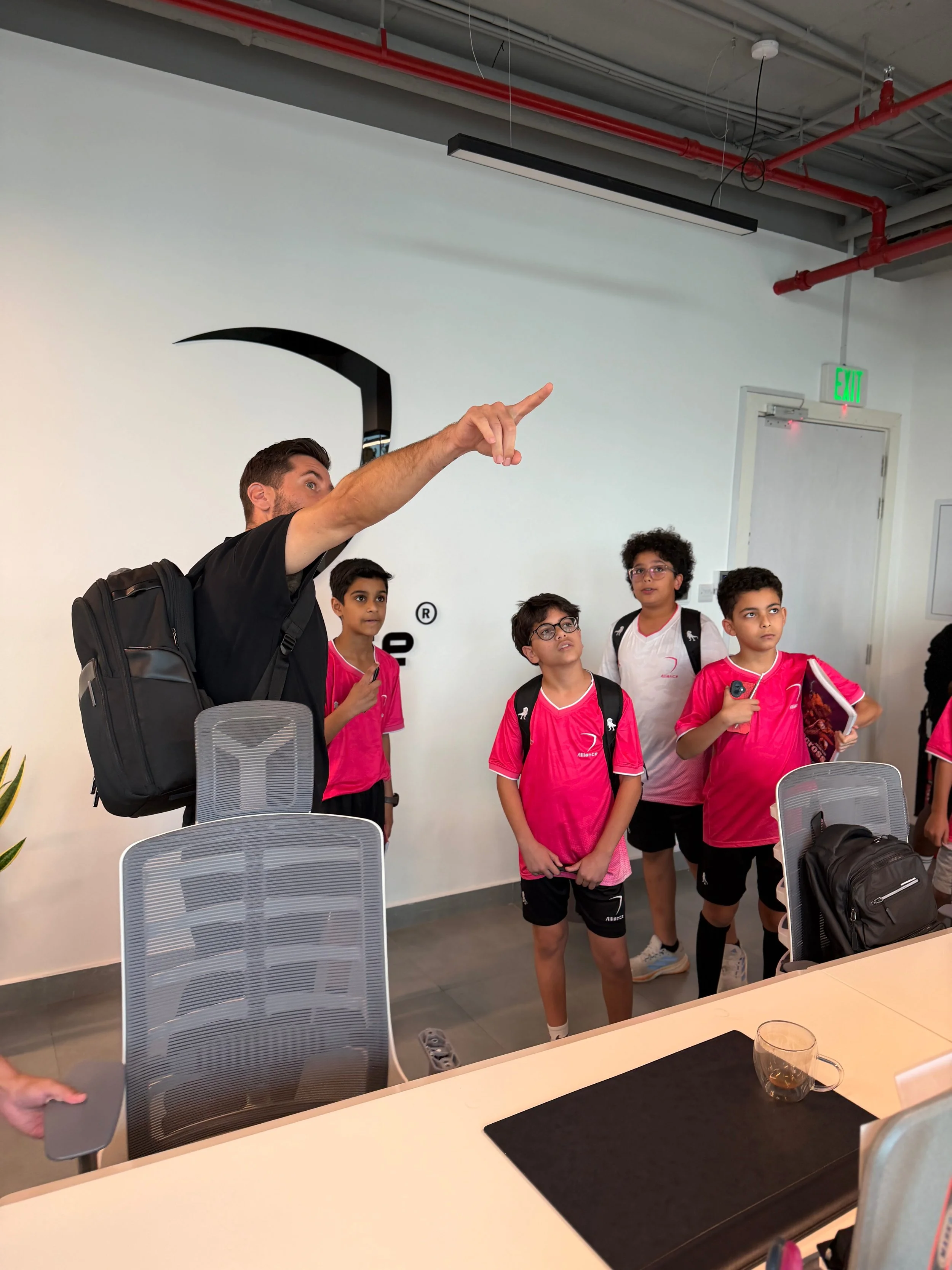 Nuno explaining the trophies.jpg