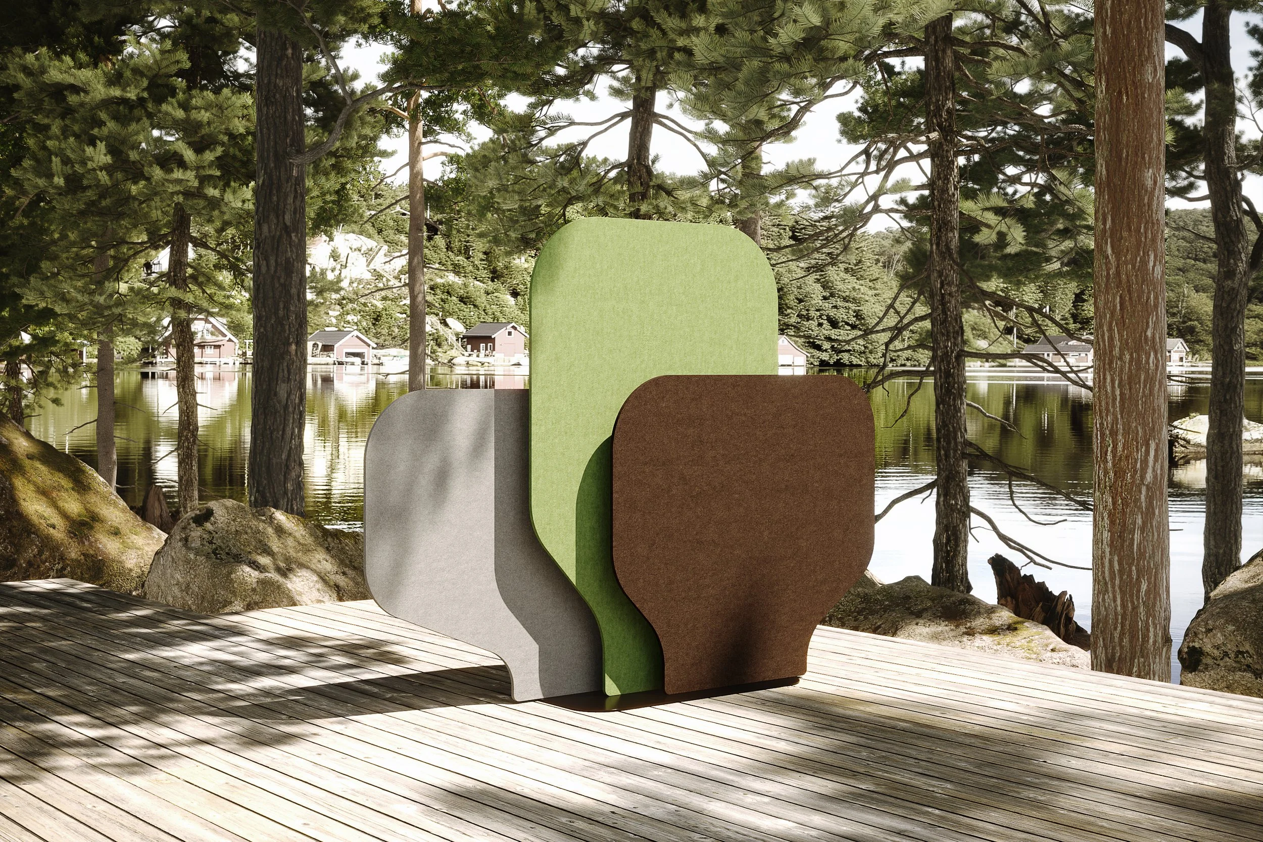 Colorful GiosFelt Landscape layered screen dividers on a wooden deck beside a lake with trees and houses in the background.