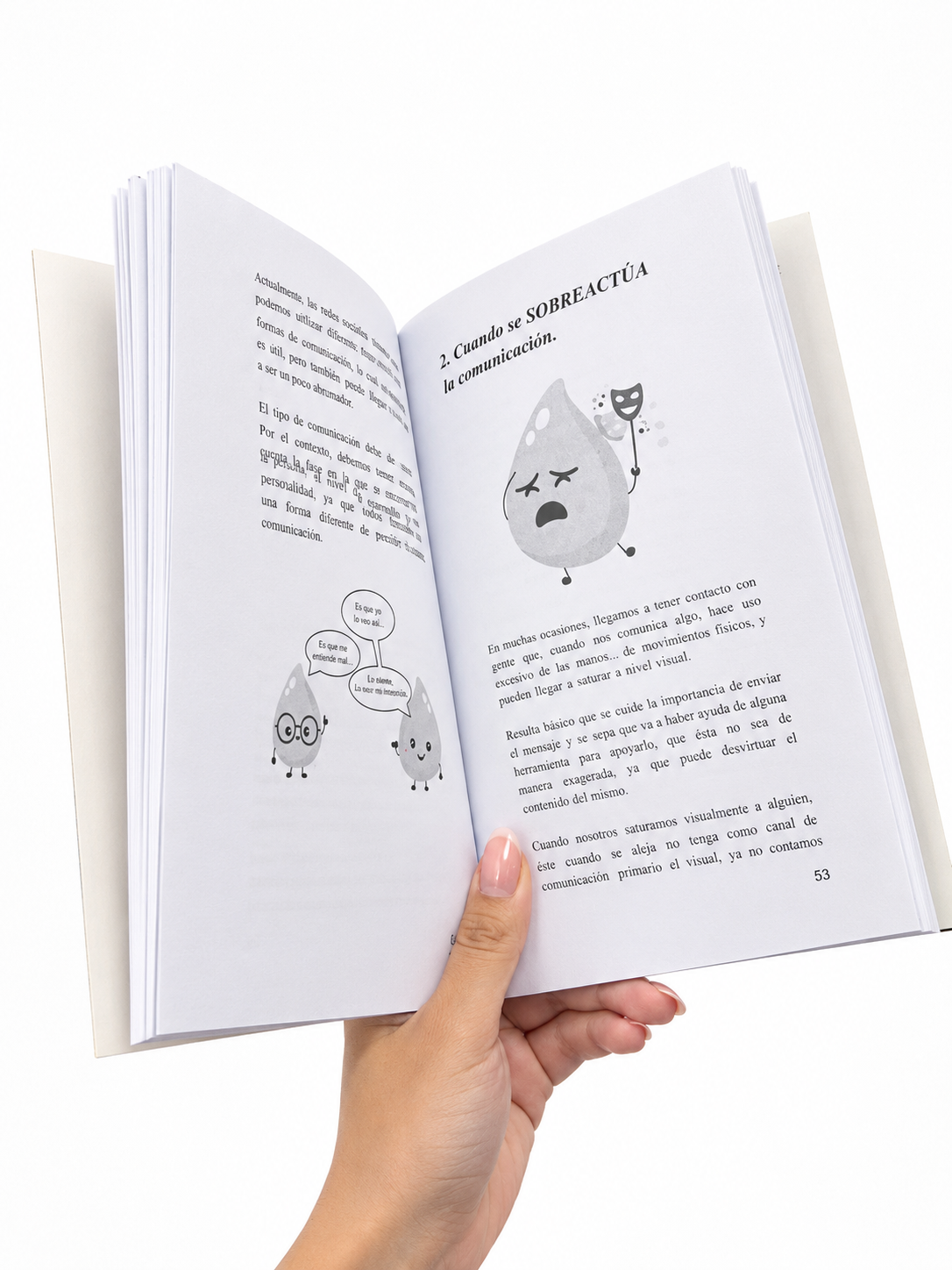 Mano sosteniendo libro abierto en español.png
