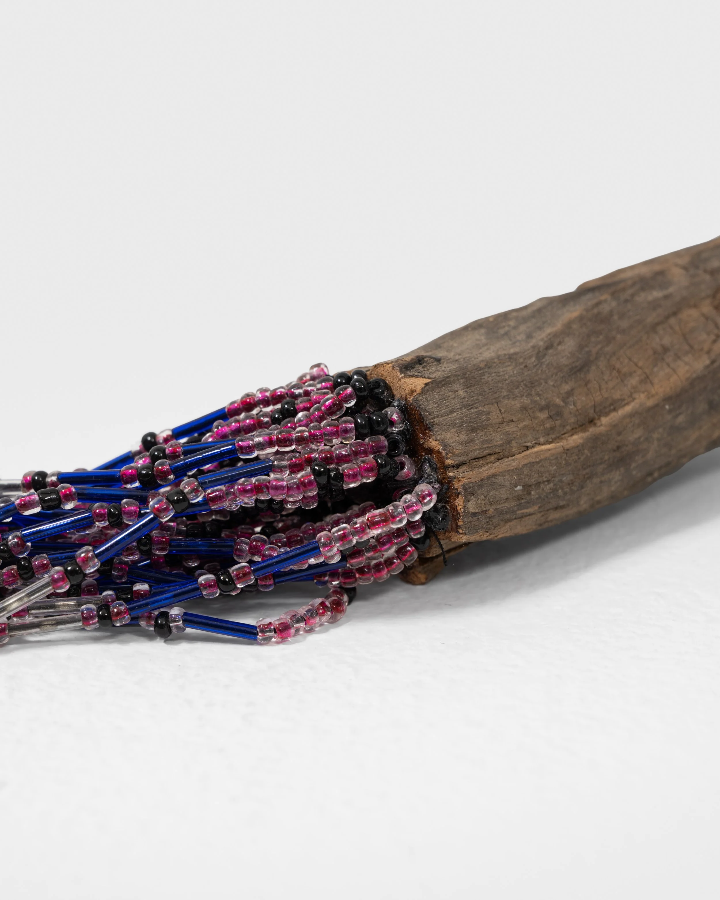 I Can Fix Anything 
found wood, string, beads, wire nails, epoxy, 
2021, 4.5" x 21" x 9" 