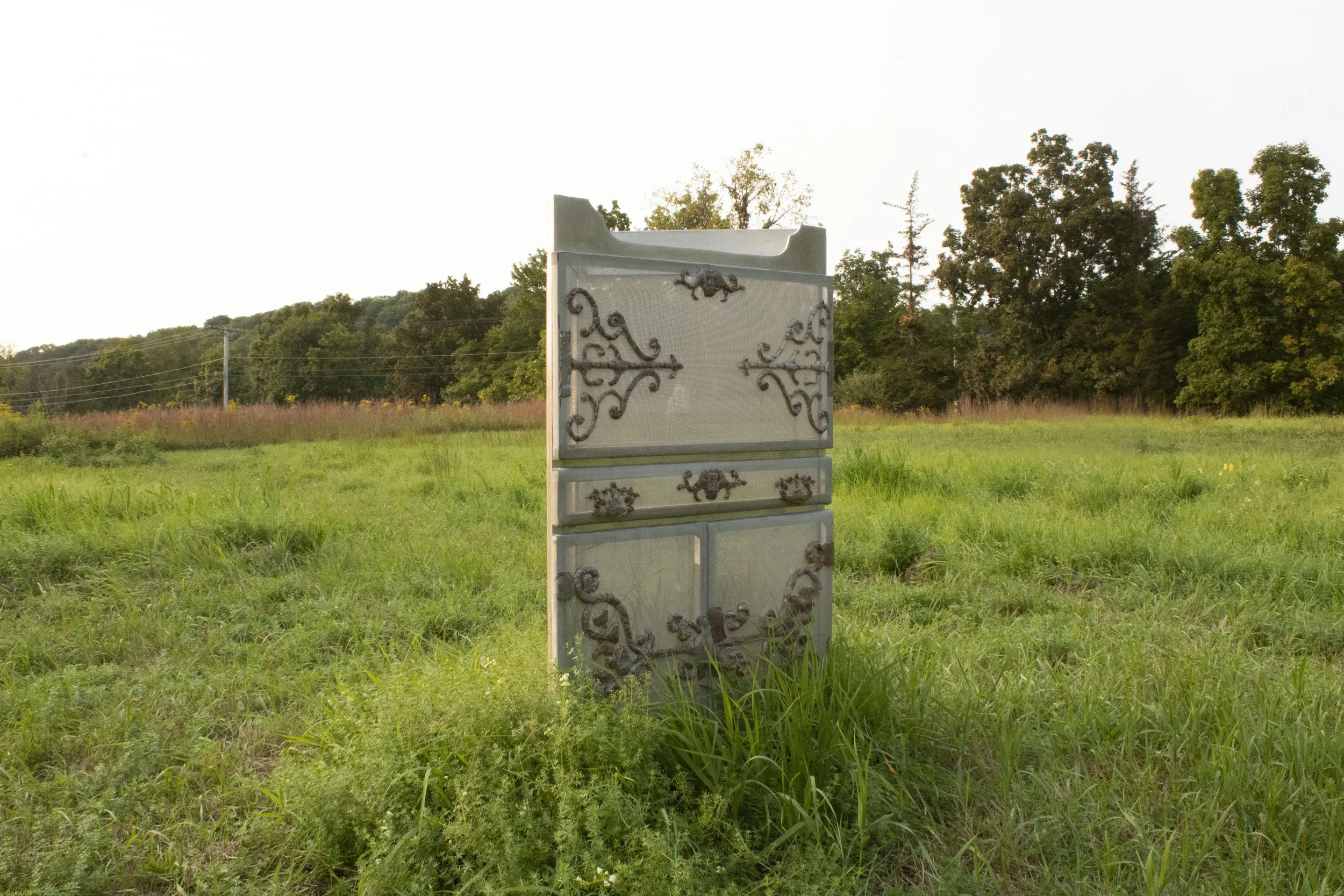 "A Corner"
aluminum, mild steel, stainless steel
2025,    48” x 28” x 17”

A phantom of an original family heirloom corner cabinet, this sculpture reflects on our desire to cherish and preserve while facing the inevitability of change and life cycles