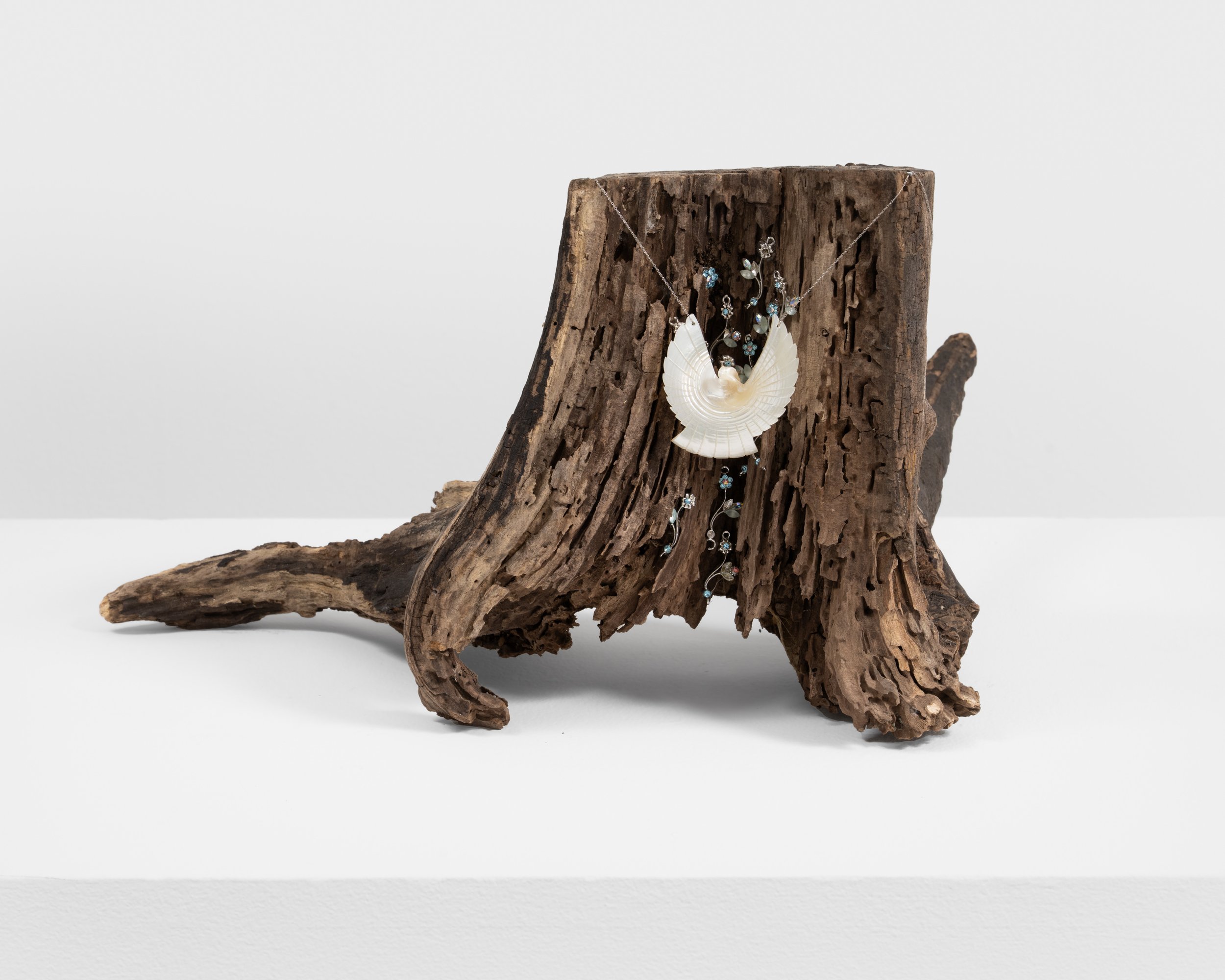 Ode to My Silence 
found wood, seashell dove, chain, rhinestone floral charms
2021, 10" x 17" x 14" 