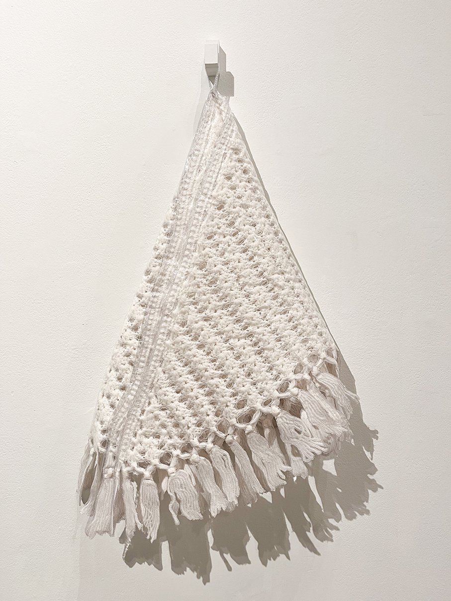 Plastic sealed crocheted shawl