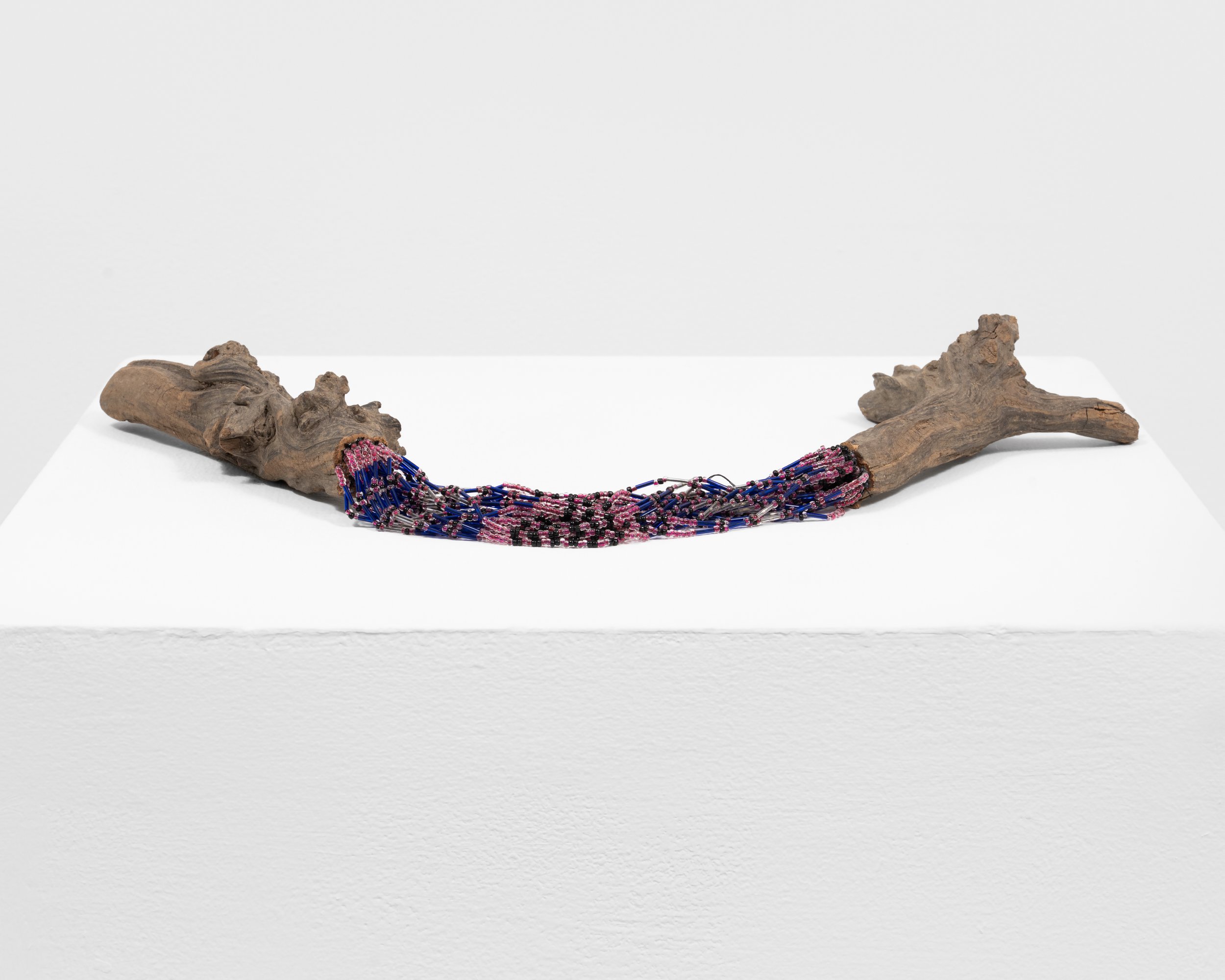 I Can Fix Anything 
found wood, string, beads, wire nails, epoxy, 
2021, 4.5" x 21" x 9" 
