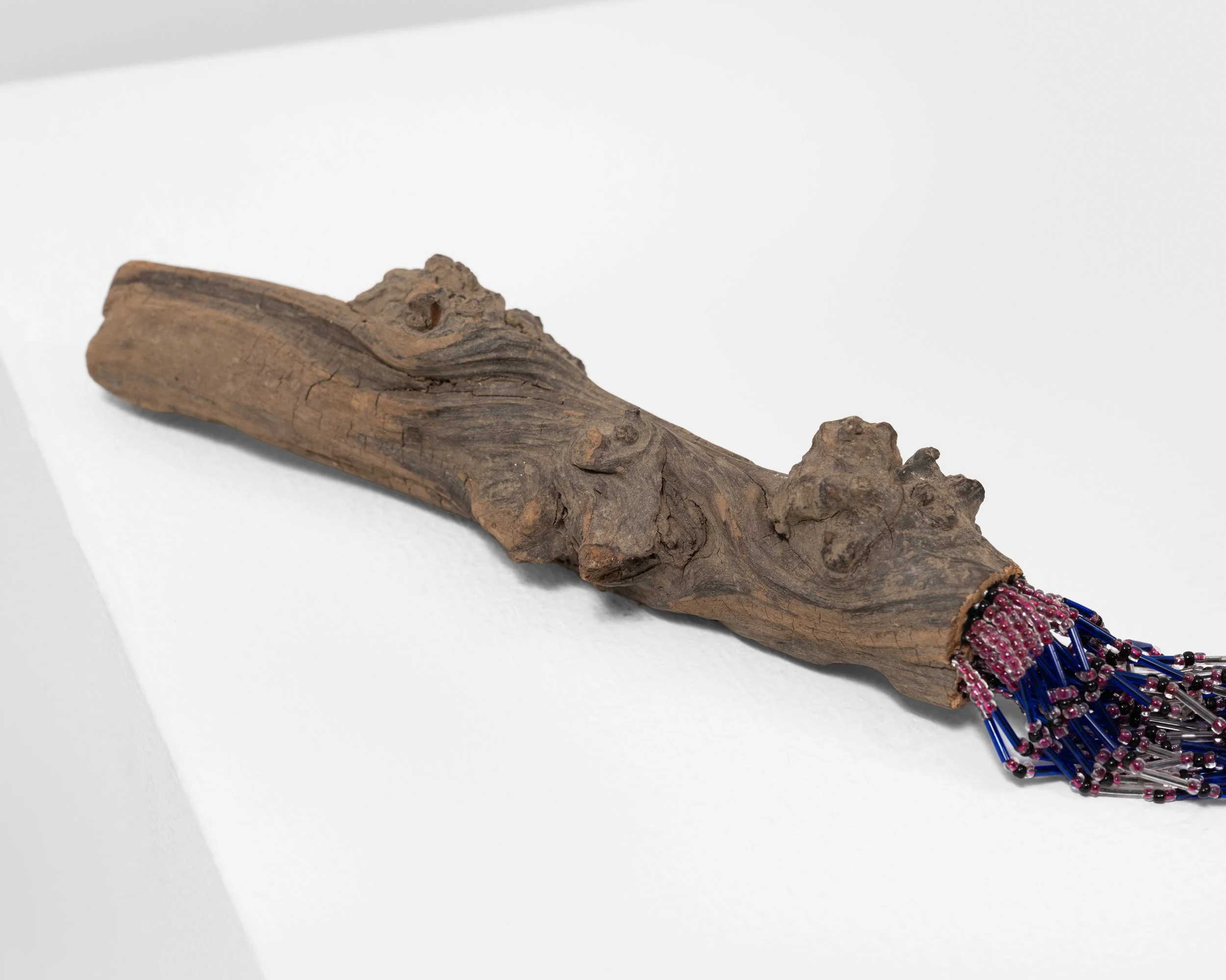 I Can Fix Anything 
found wood, string, beads, wire nails, epoxy, 
2021, 4.5" x 21" x 9" 