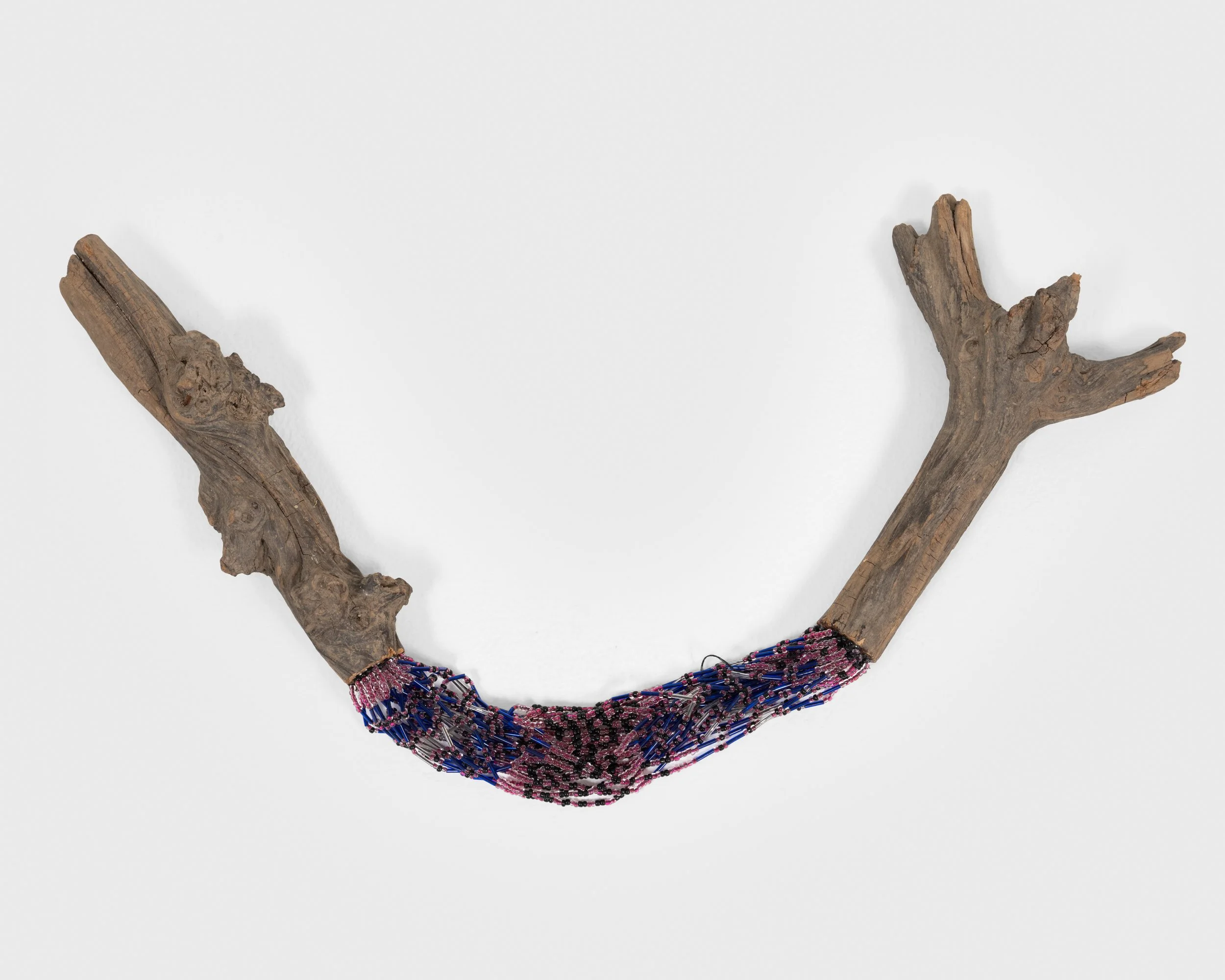 I Can Fix Anything 
found wood, string, beads, wire nails, epoxy, 
2021, 4.5" x 21" x 9" 