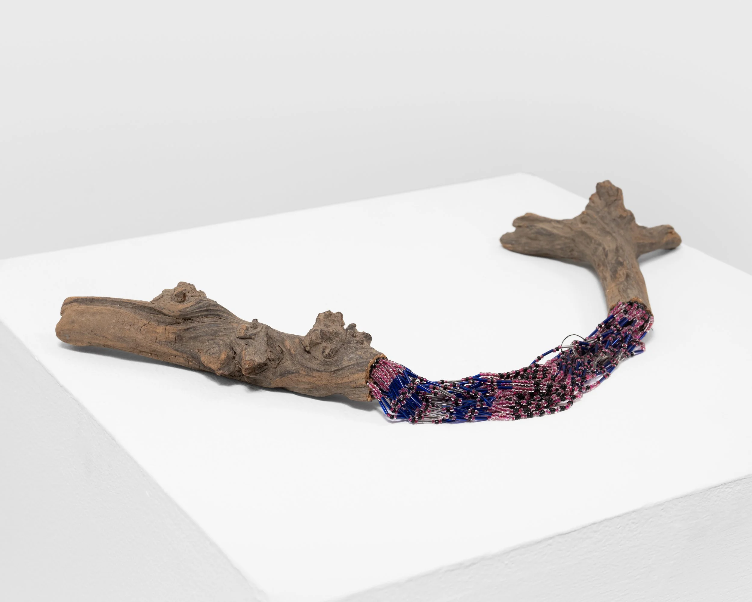 I Can Fix Anything 
found wood, string, beads, wire nails, epoxy, 
2021, 4.5" x 21" x 9" 