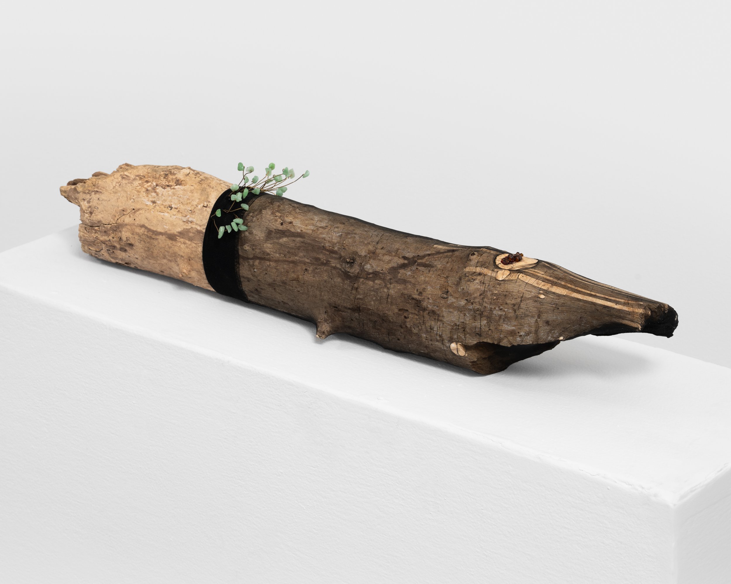 Angel Came Back When I Scraped My Knee
found wood, nylon stocking, brass wire, jade beads, glass beads, epoxy, wire nails 
2021, 6.5" x 28" x 5" 