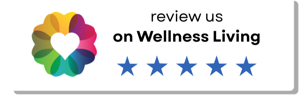 Review request with five-star rating on Wellness Living, featuring a colorful heart-shaped logo.