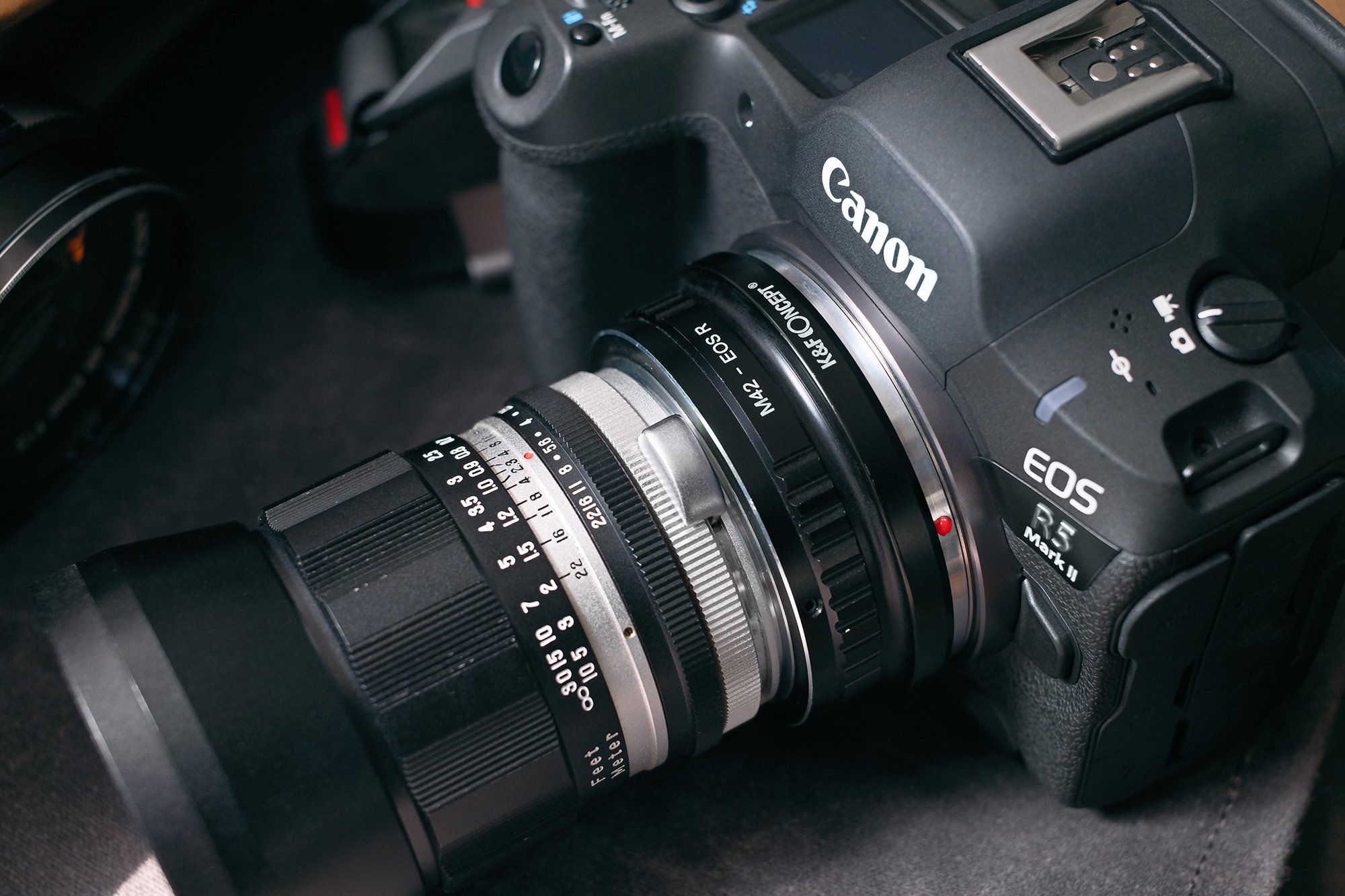 Picture of the Asahi Auto Takumar 35mm f/2.3 mounted on the Canon EOS R5 Mark II with an adapter.