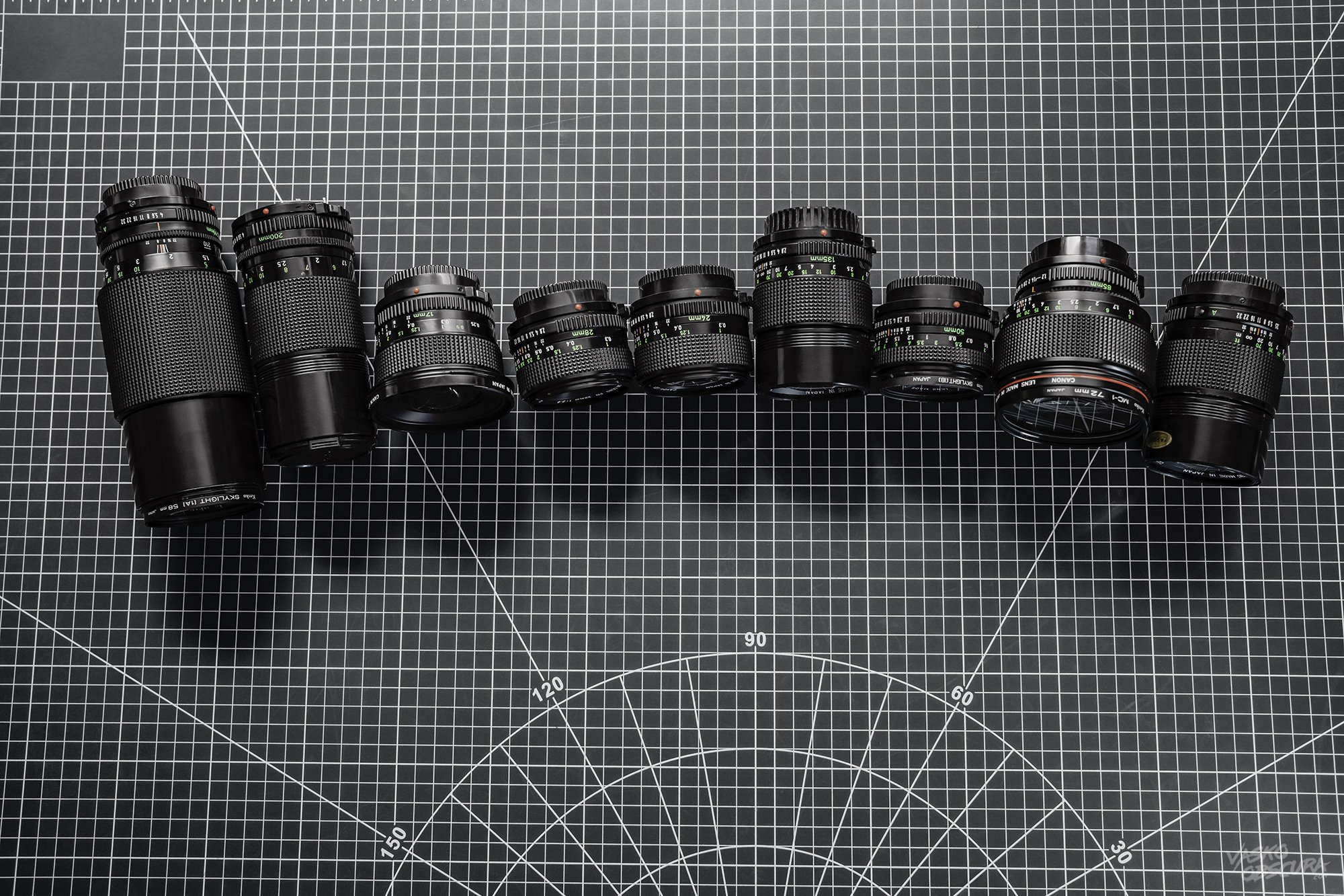 a photo of several Canon new nFD lenses.