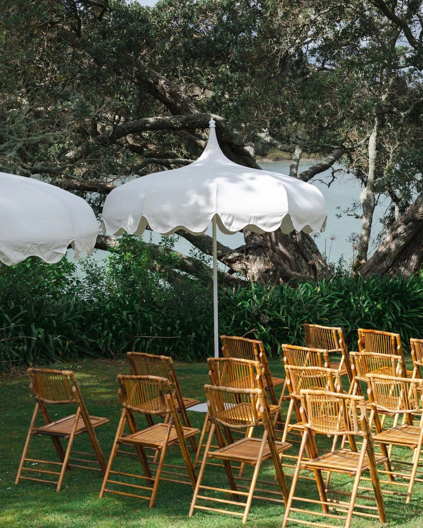 The Flock Edit: An elegant celebration at Orakei Bay for a recent styled shoot with @collectivenz , featuring our Capri Umbrellas, Bamboo Chairs for the ceremony, and Harry Sand Chairs for the reception.⁠
⁠
The vision was brought to life by an incred