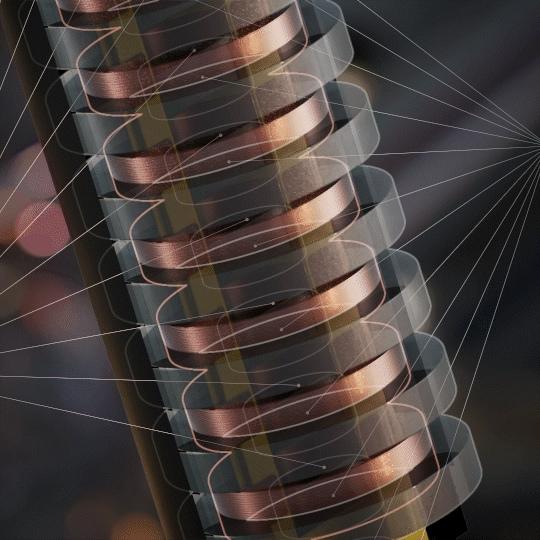 Close-up of a mechanical or electronic device with coiled copper wire wrapped around a metallic core, possibly a transformer or motor part.