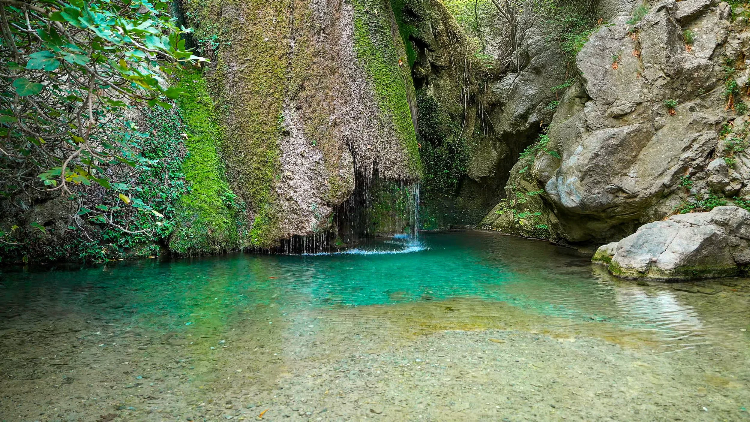Reflective Retreat – Turquoise Pool Waterfall in Crete, Greece