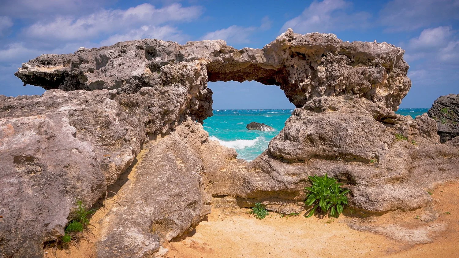 Natural rock arch and turquoise ocean water in Bermuda from the 3-hour peaceful piano music video Room To Breathe by Dean Best.