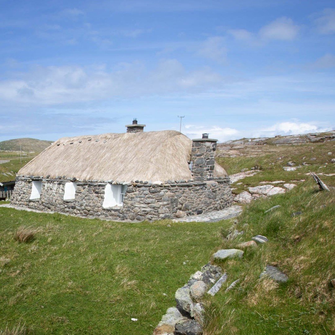 Our lovingly restored, traditional blackhouse nestled into the rocky shoreline. Located in a cluster of some of the best preserved thatched cottages in Scotland - and one of the Hebrides only conservation areas - Taigh Ailean is just a few minutes wa